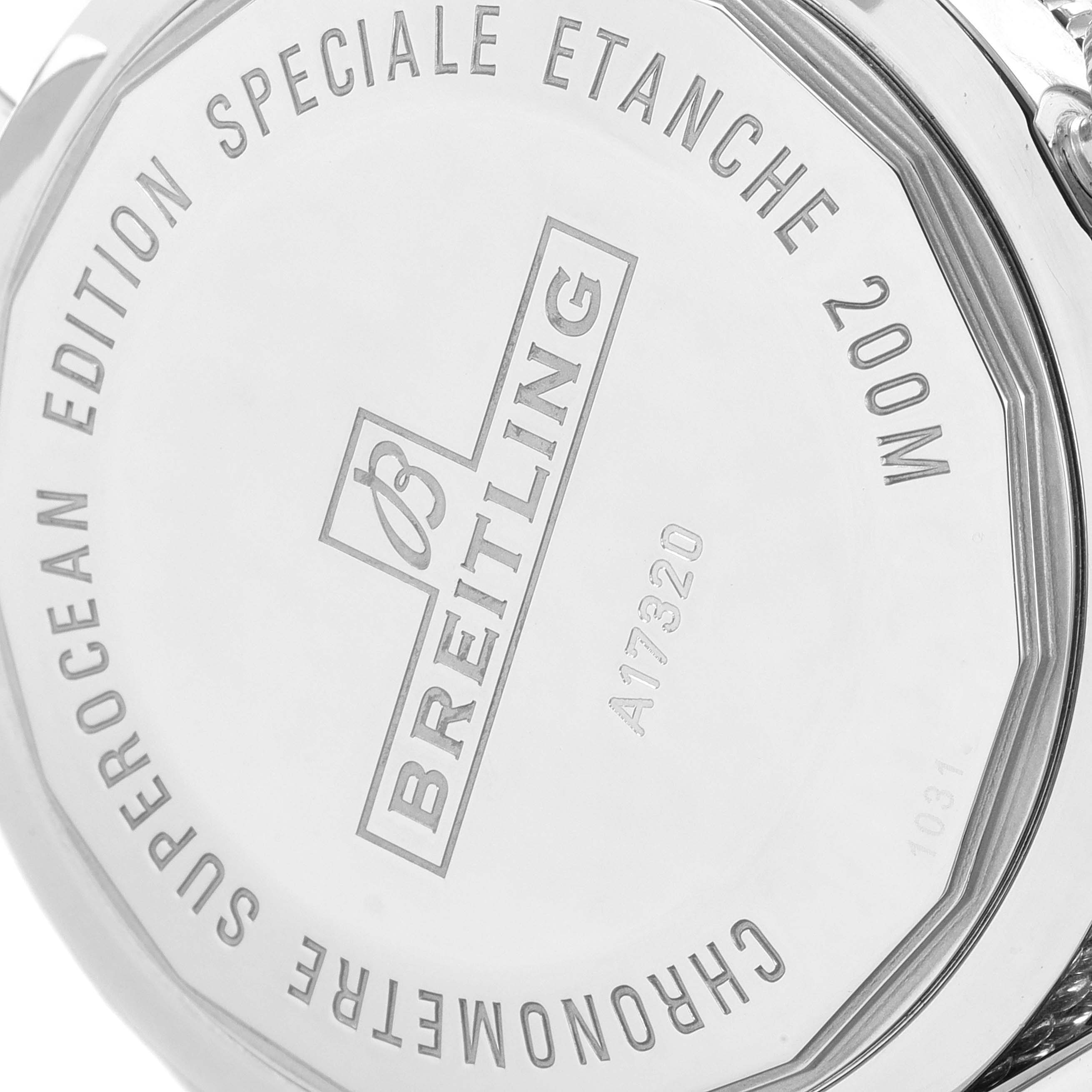 The image shows the back of a Breitling Superocean A17320 Men's Stainless Steel Brown Dial A17320 Men's Stainless Steel Brown Dial watch, highlighting the engravings and brand logo.