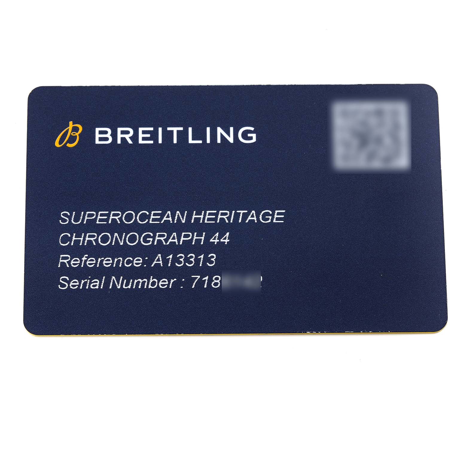 A Breitling Superocean A13313 Men's Stainless Steel Blue Dial A13313 Men's Stainless Steel Blue Dial Heritage Chronograph 44 warranty card showing the reference and serial number.