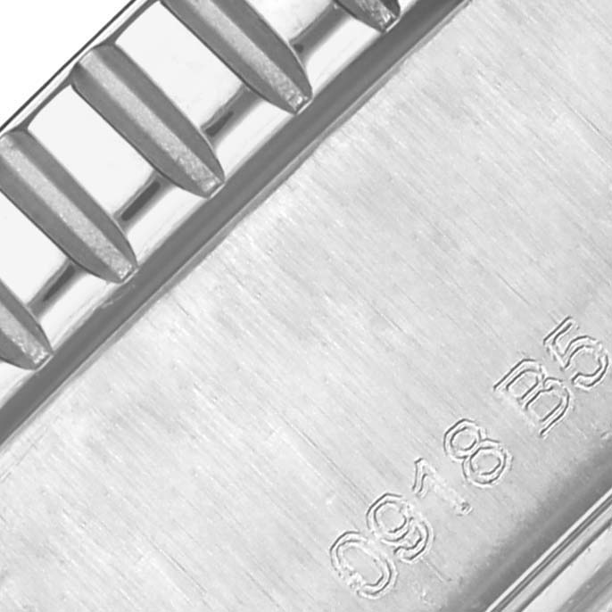 This image shows a close-up of the brushed metal bracelet with engraved markings of the Breitling Superocean A17392 Men's Stainless Steel Blue Dial A17392 Men's Stainless Steel Blue Dial watch.