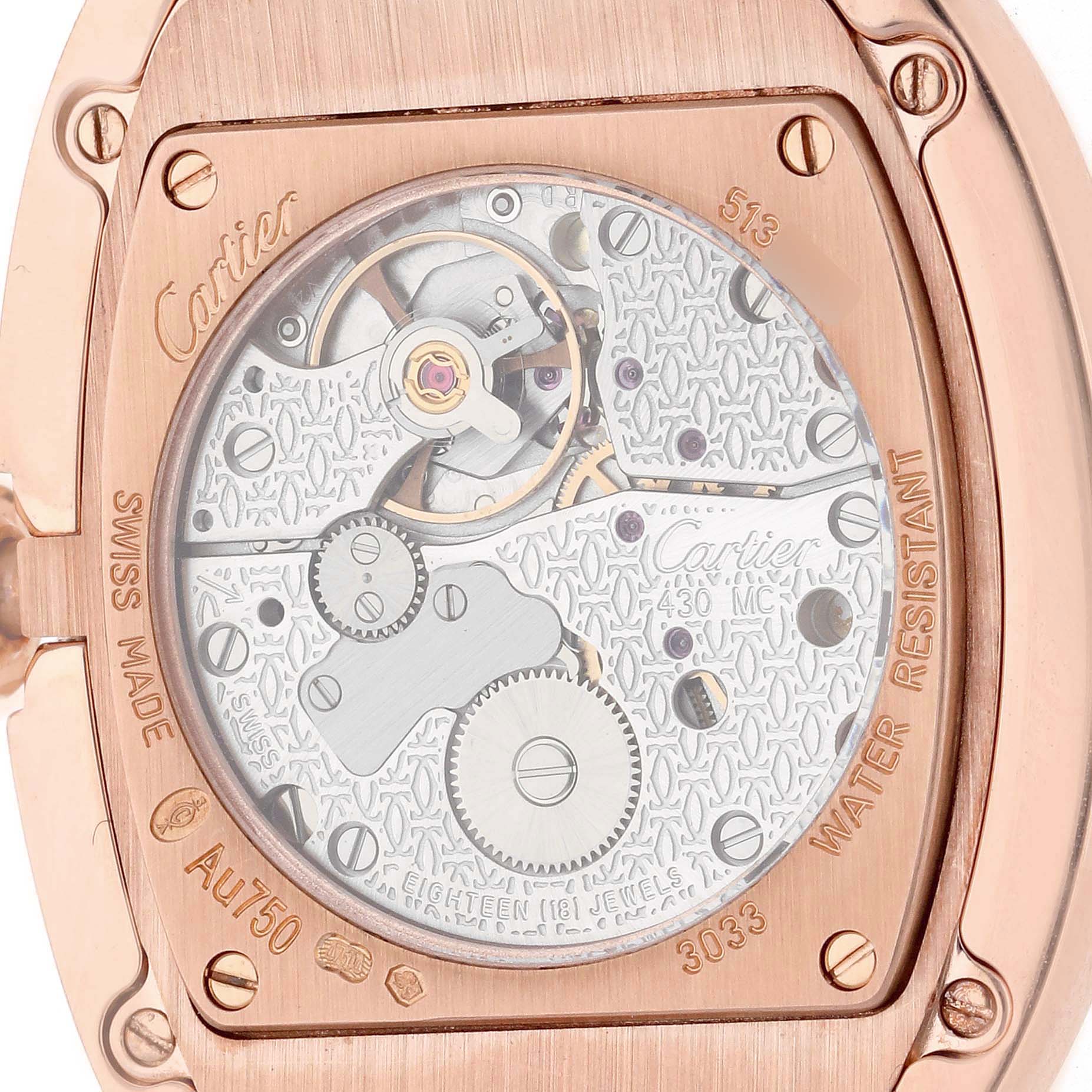 The image shows the back view of a Cartier Baignoire WB520005 Women
s Rose Gold Silver Dial WB520005 Women
s Rose Gold Silver Dial watch, featuring its movement and inner workings.