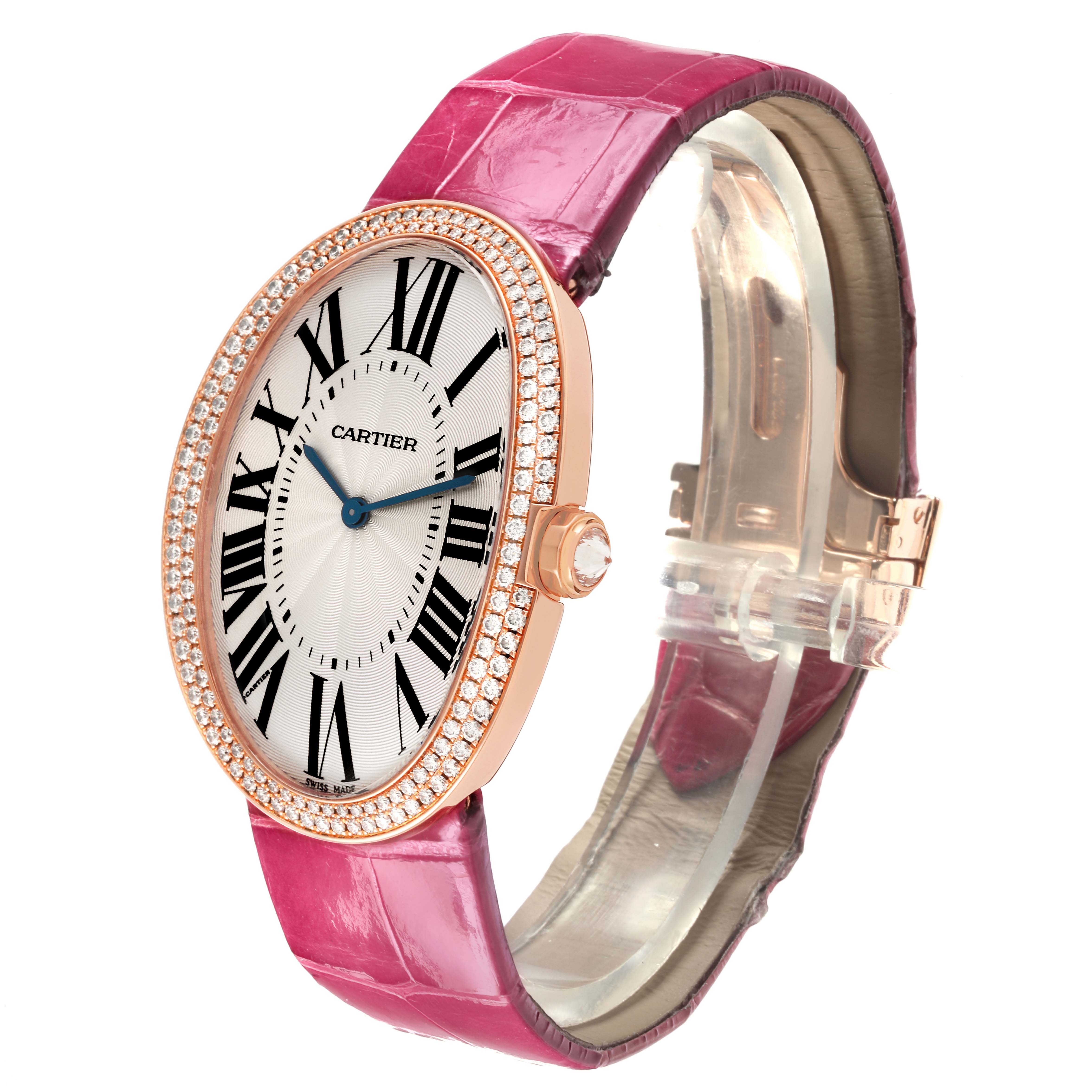 The Cartier Baignoire WB520005 Women
s Rose Gold Silver Dial WB520005 Women
s Rose Gold Silver Dial watch is shown at a slight angle, displaying the face, bezel, and pink strap.