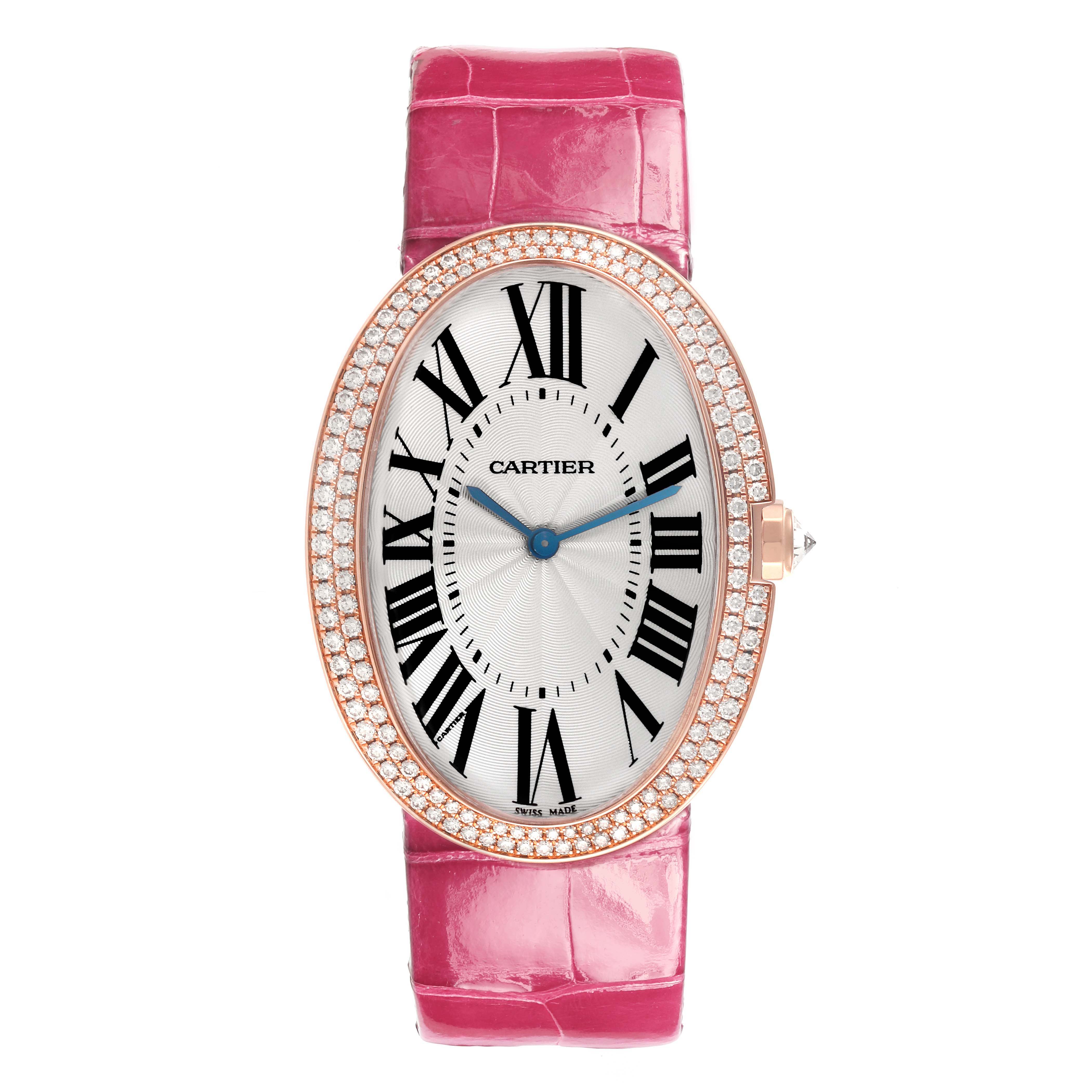 The Cartier Baignoire WB520005 Women
s Rose Gold Silver Dial WB520005 Women
s Rose Gold Silver Dial watch is shown from a top view, highlighting the pink strap, oval face, and diamond-set bezel.