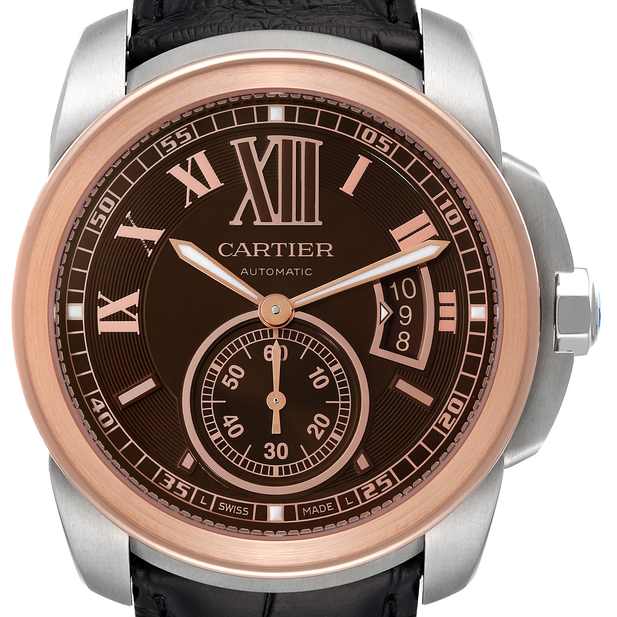 The image shows a front view of a Calibre de Cartier watch by Cartier, highlighting the dial, hands, and crown.