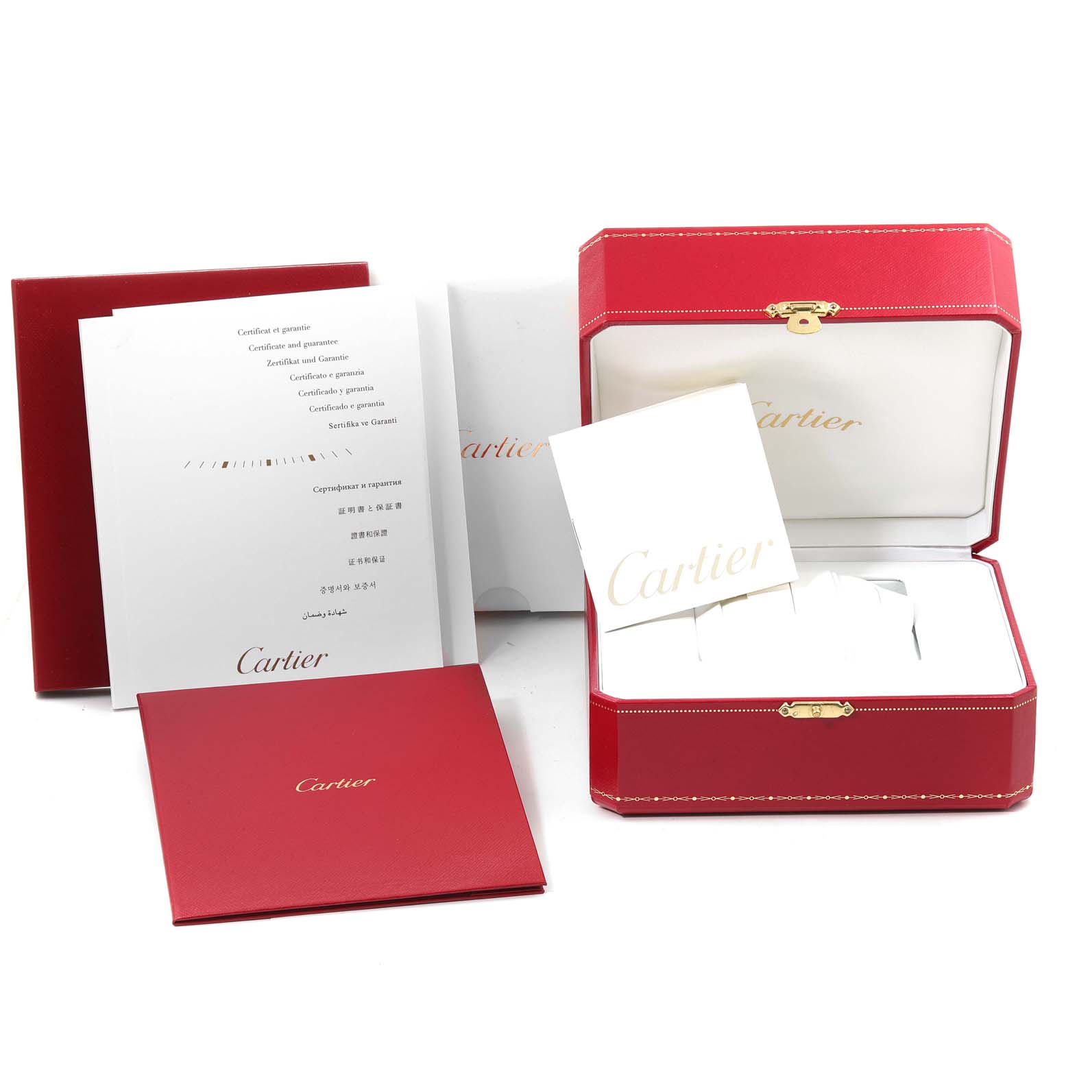 The image shows the packaging and documents for the Calibre de Cartier watch by Cartier, including the watch box and certification papers.