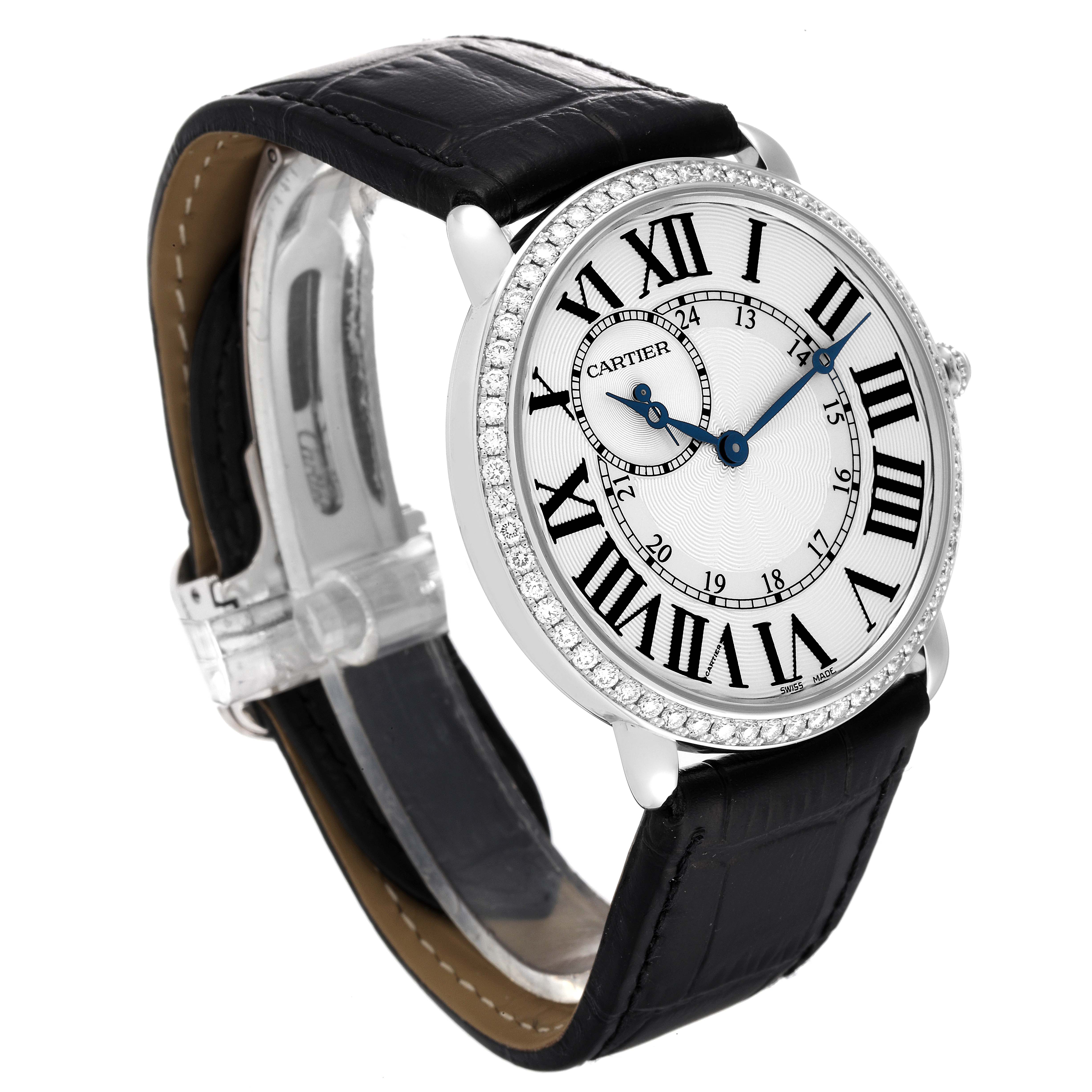 The image shows a Cartier Ronde WR007002 Men's White Gold Silver Dial WR007002 Men's White Gold Silver Dial watch at an angle displaying the face, bezel, strap, and buckle.