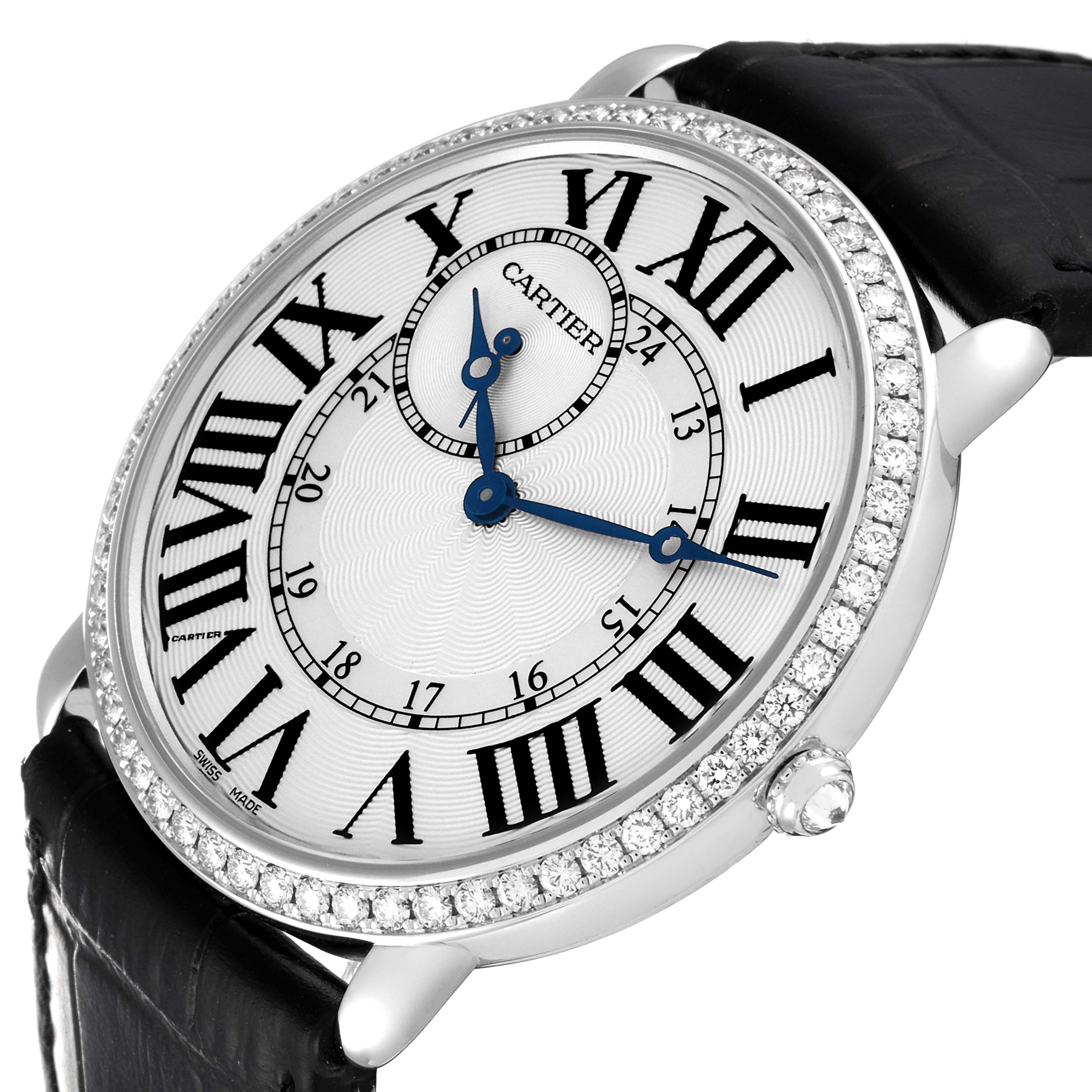 This image shows a close-up angle of the Cartier Ronde WR007002 Men's White Gold Silver Dial WR007002 Men's White Gold Silver Dial watch, featuring its face, bezel, and black strap.