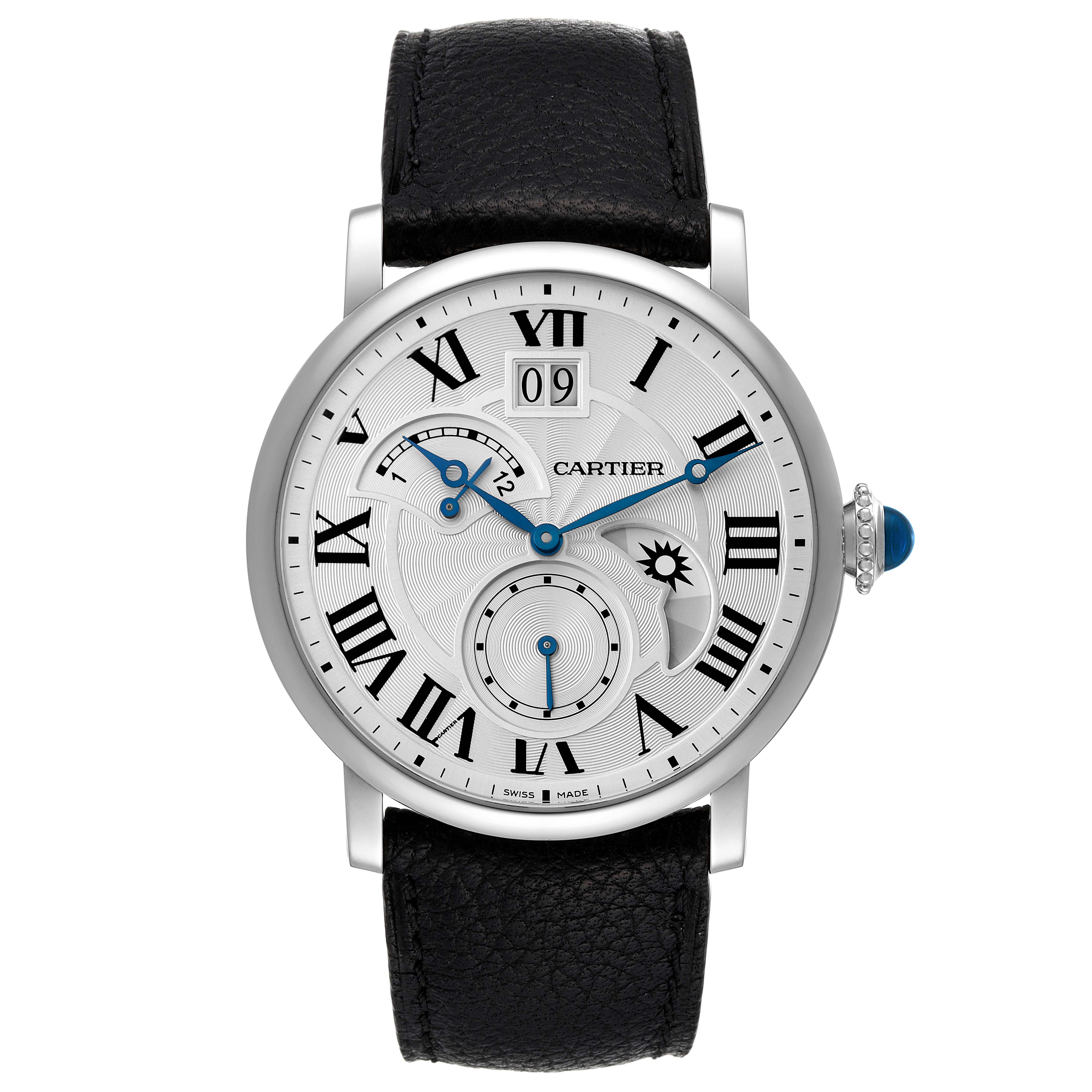 The Rotonde model by Cartier is shown from a front angle, displaying its dial, blue hands, Roman numerals, and black leather strap.