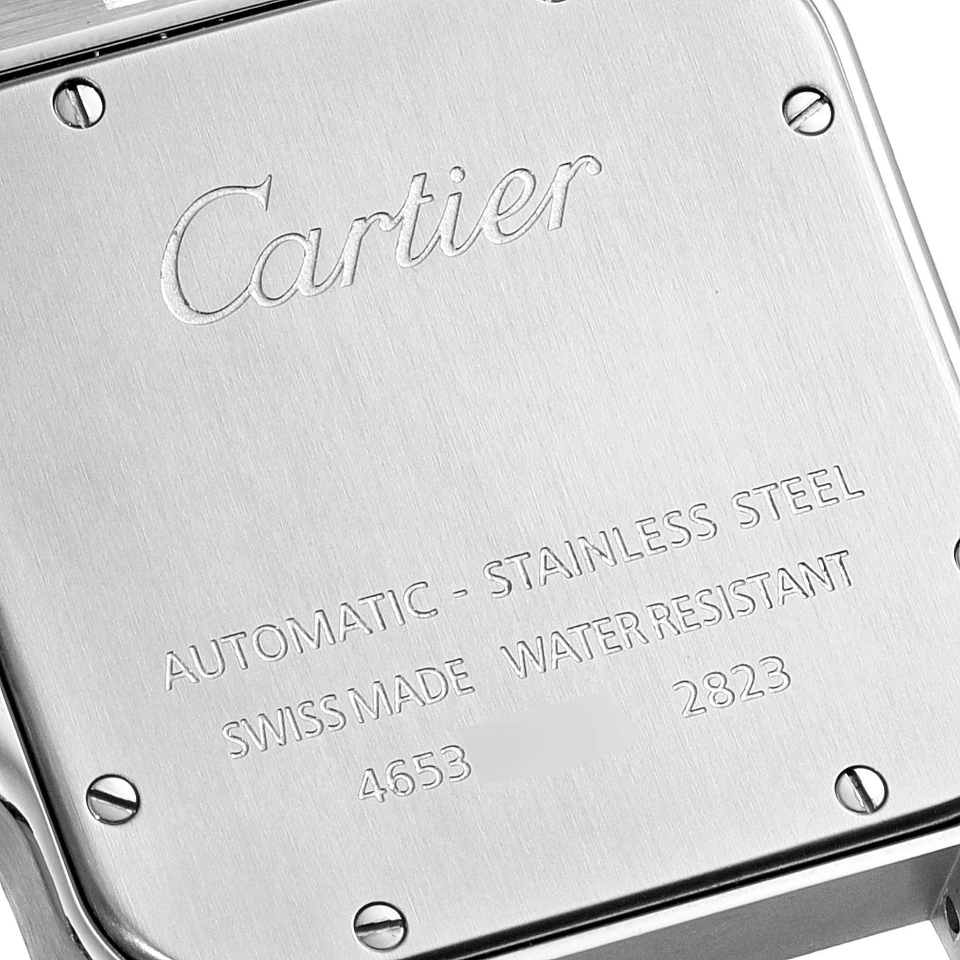 This image shows the stainless steel case back of a Cartier Santos W20098D6 Men's Stainless Steel Silver Dial W20098D6 Men's Stainless Steel Silver Dial watch.