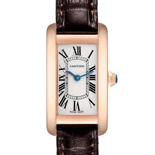 The Cartier Tank Américaine watch is shown from a front view, highlighting its face, Roman numerals, and leather strap.