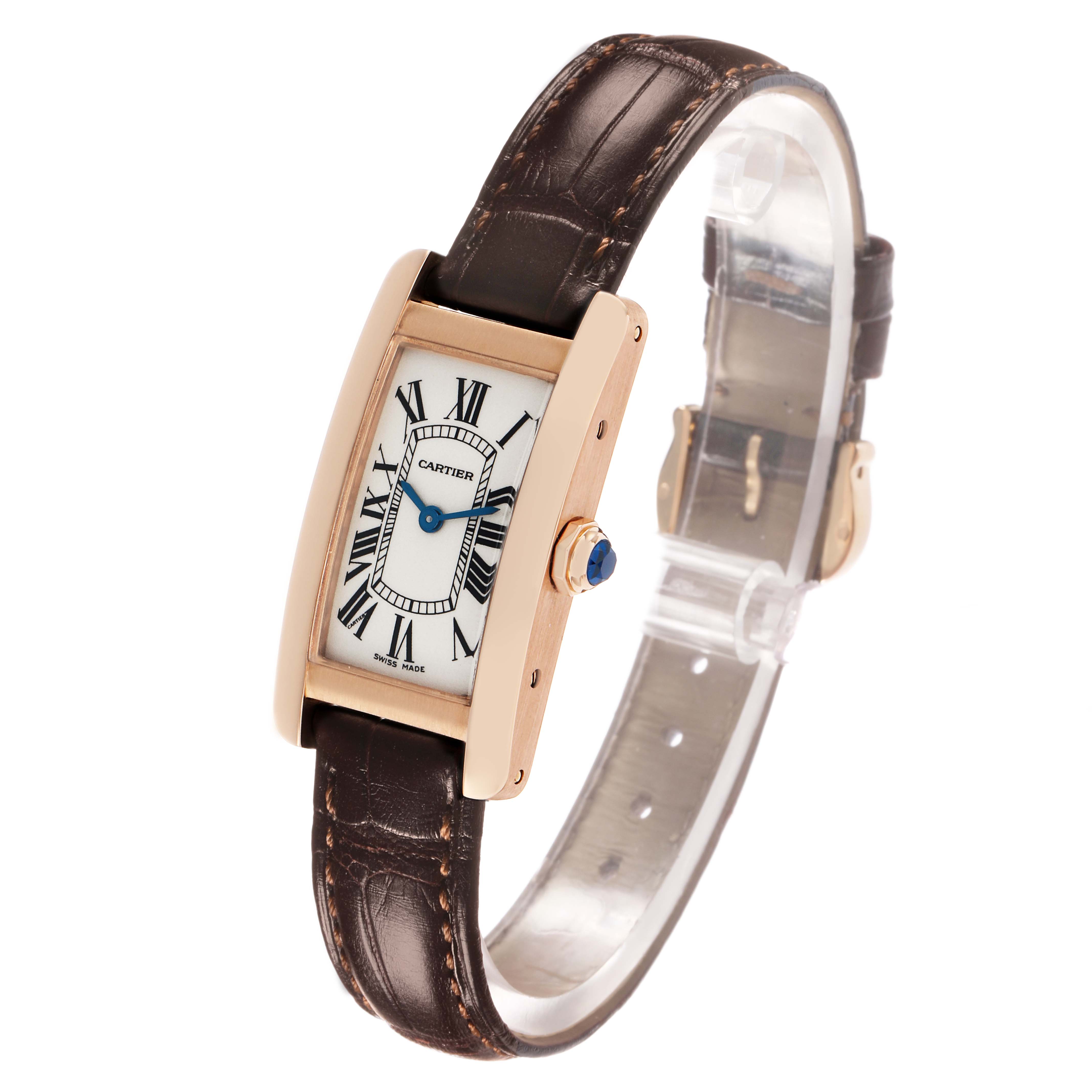 The Cartier Tank Americaine W2607456 Women's Rose Gold Silver Dial watch is shown at an angled view, highlighting its rectangular face, Roman numerals, and brown leather strap.