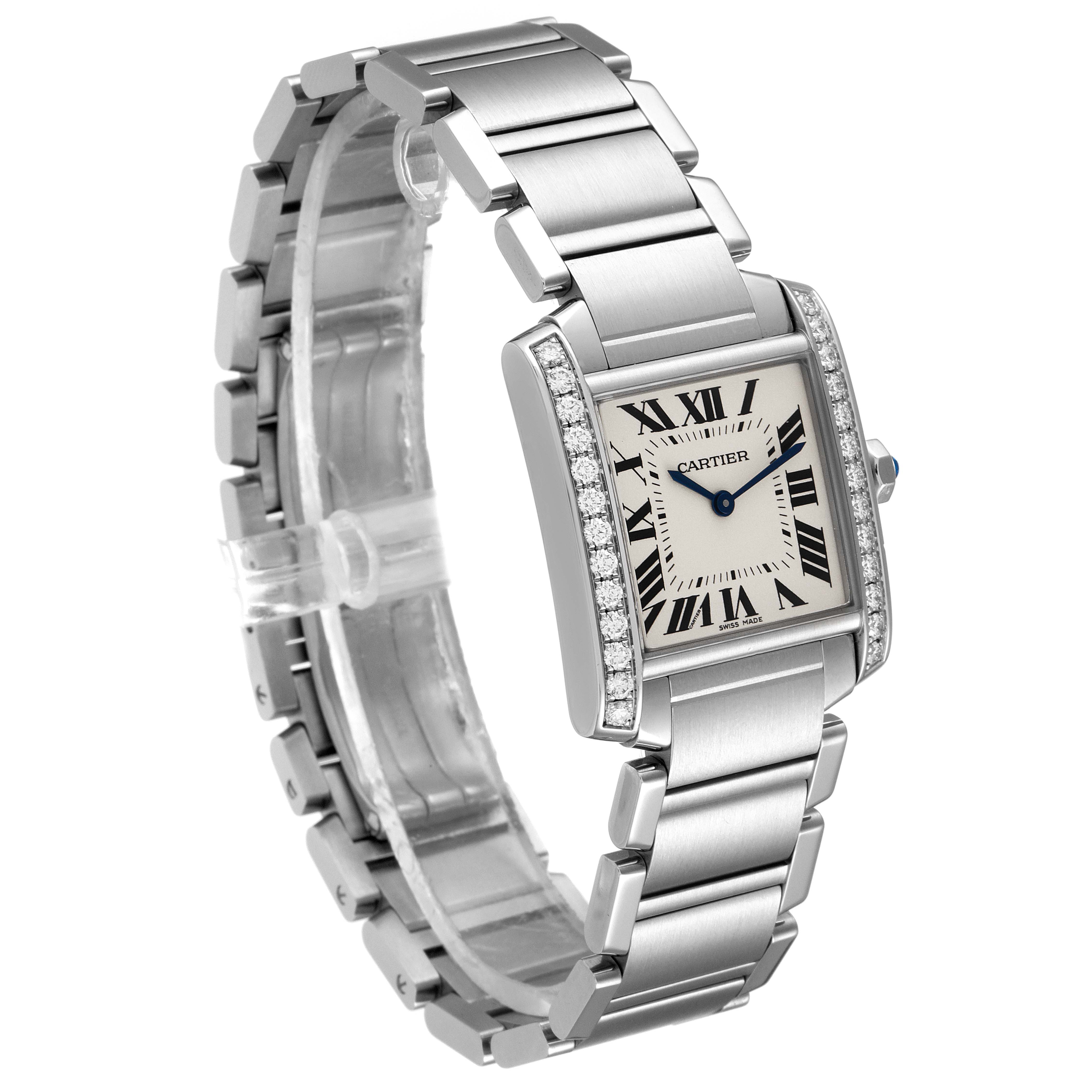 The image shows a Cartier Tank Francaise W4TA0009 Women
s Stainless Steel Silver Dial W4TA0009 Women
s Stainless Steel Silver Dial watch angled slightly to display the face, bracelet, and side profile with diamond accents.