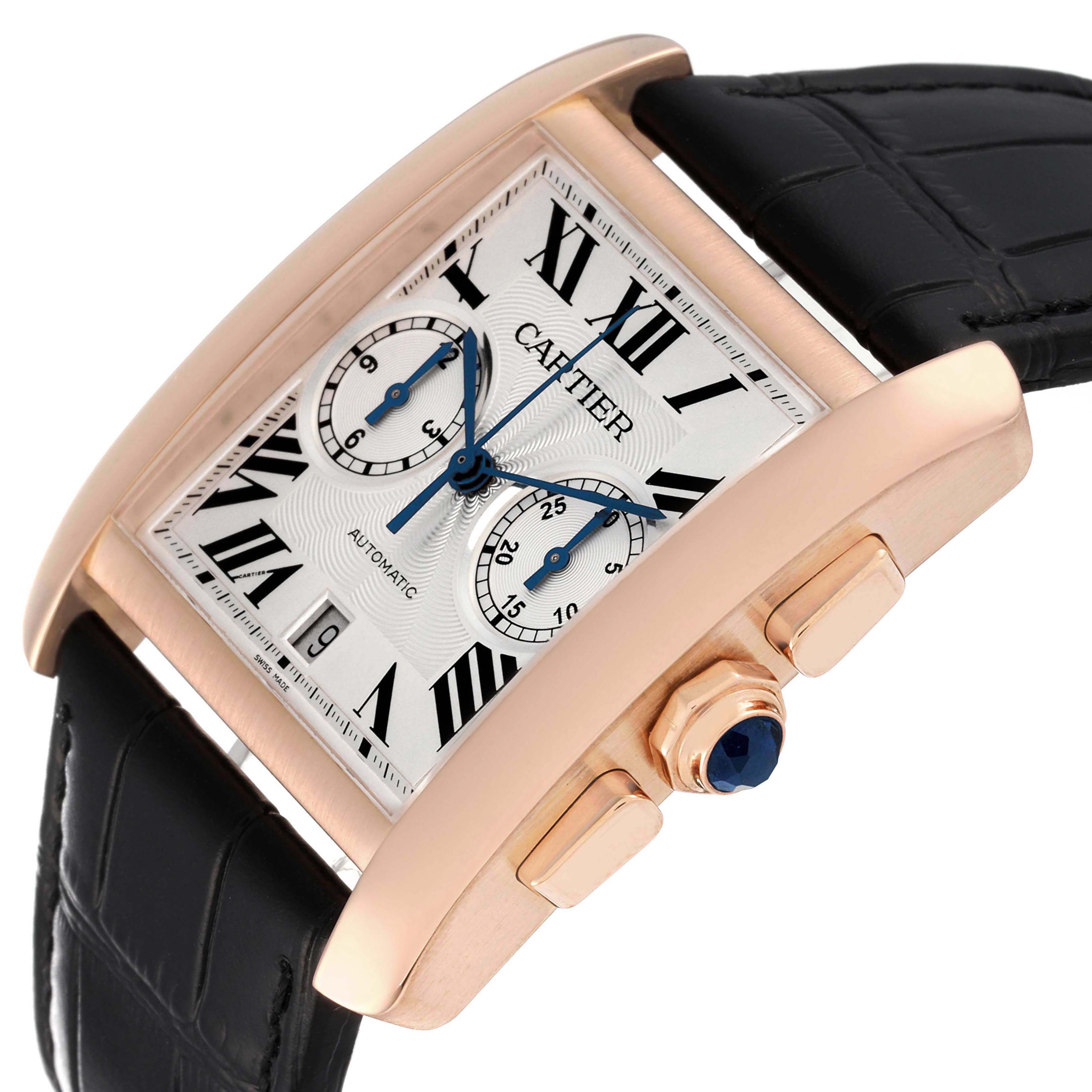 The image shows a Tank MC model by Cartier at a slight angle, highlighting the dial, crown, and part of the black strap.