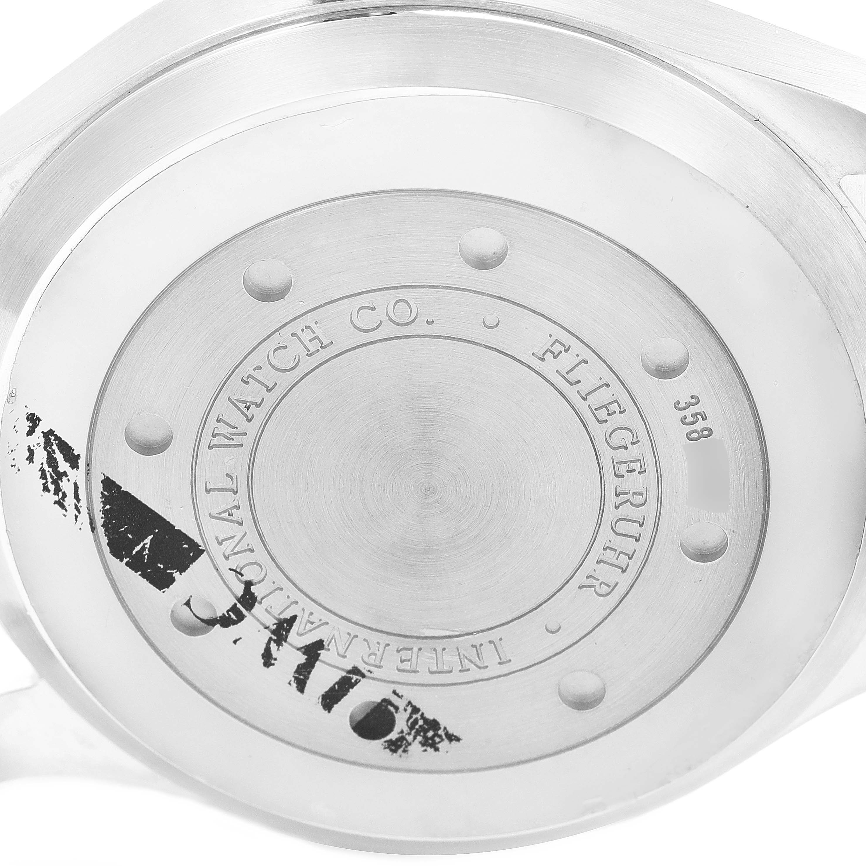 The image shows the case back of an IWC Pilot IW500401 Men's Stainless Steel Black Dial IW500401 Men's Stainless Steel Black Dial model watch.