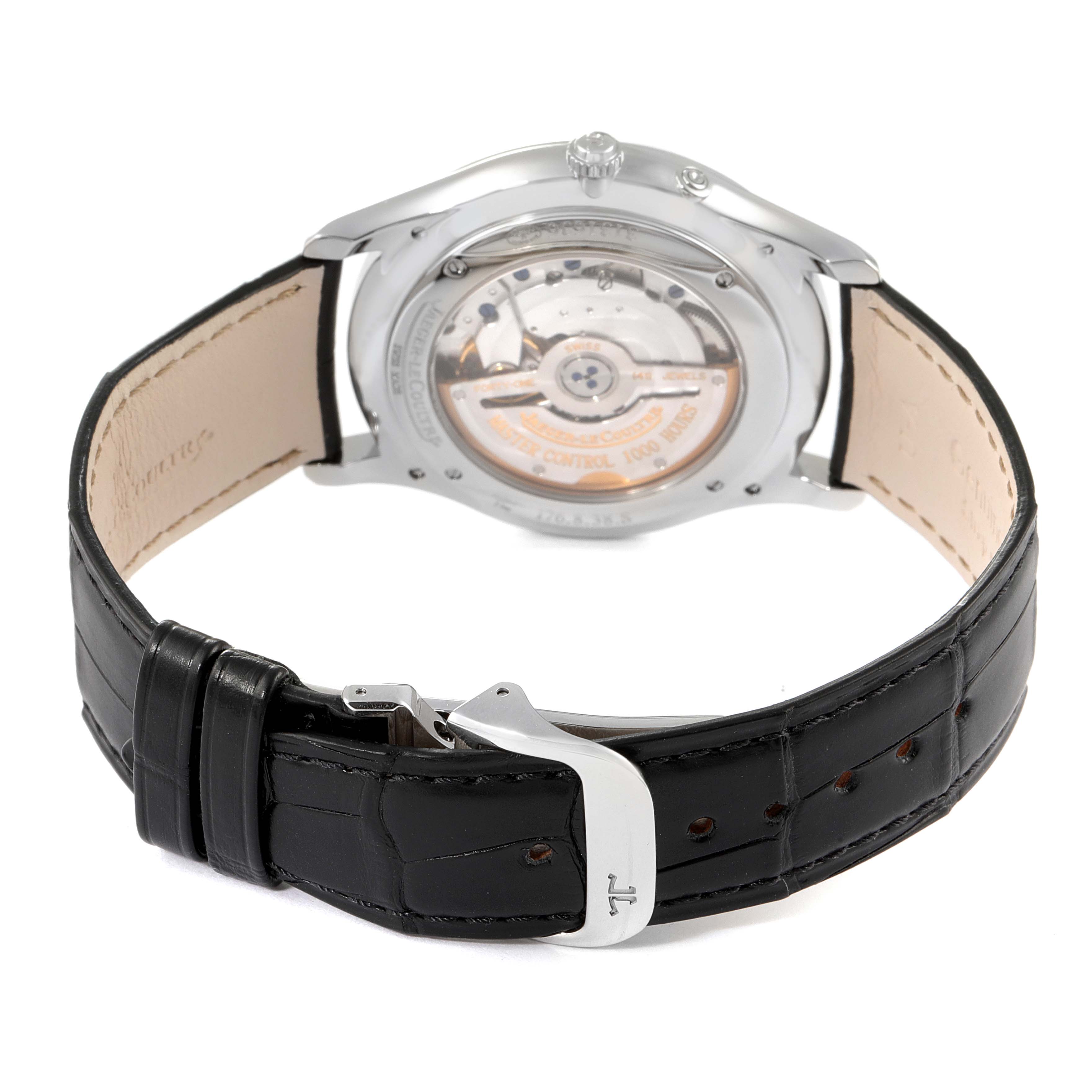 The Jaeger-LeCoultre Master model watch is shown from the back, featuring the movement and black leather strap with a buckle.