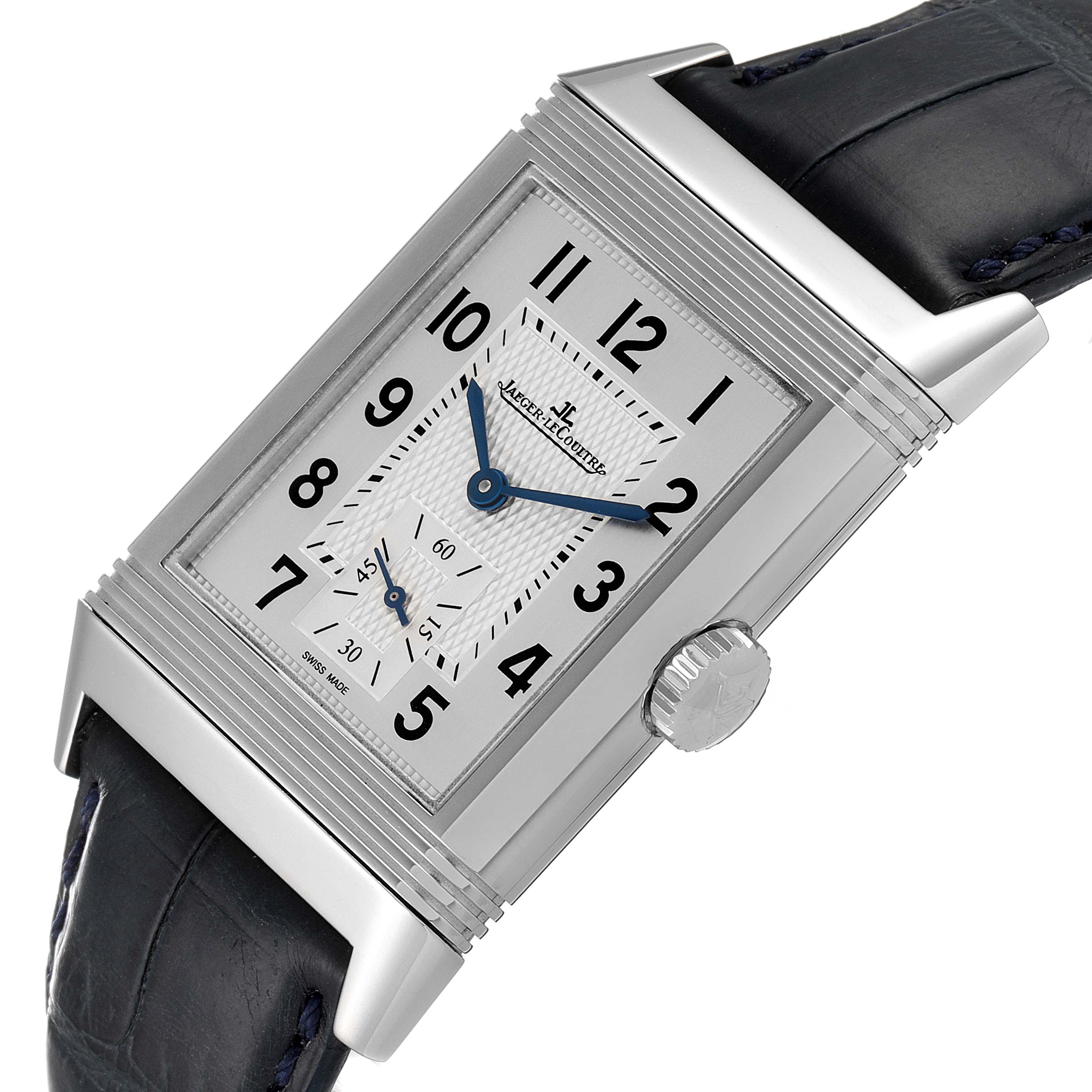 The image shows a close-up, angled view of the Jaeger-LeCoultre Reverso watch, highlighting the dial, hands, and leather strap.