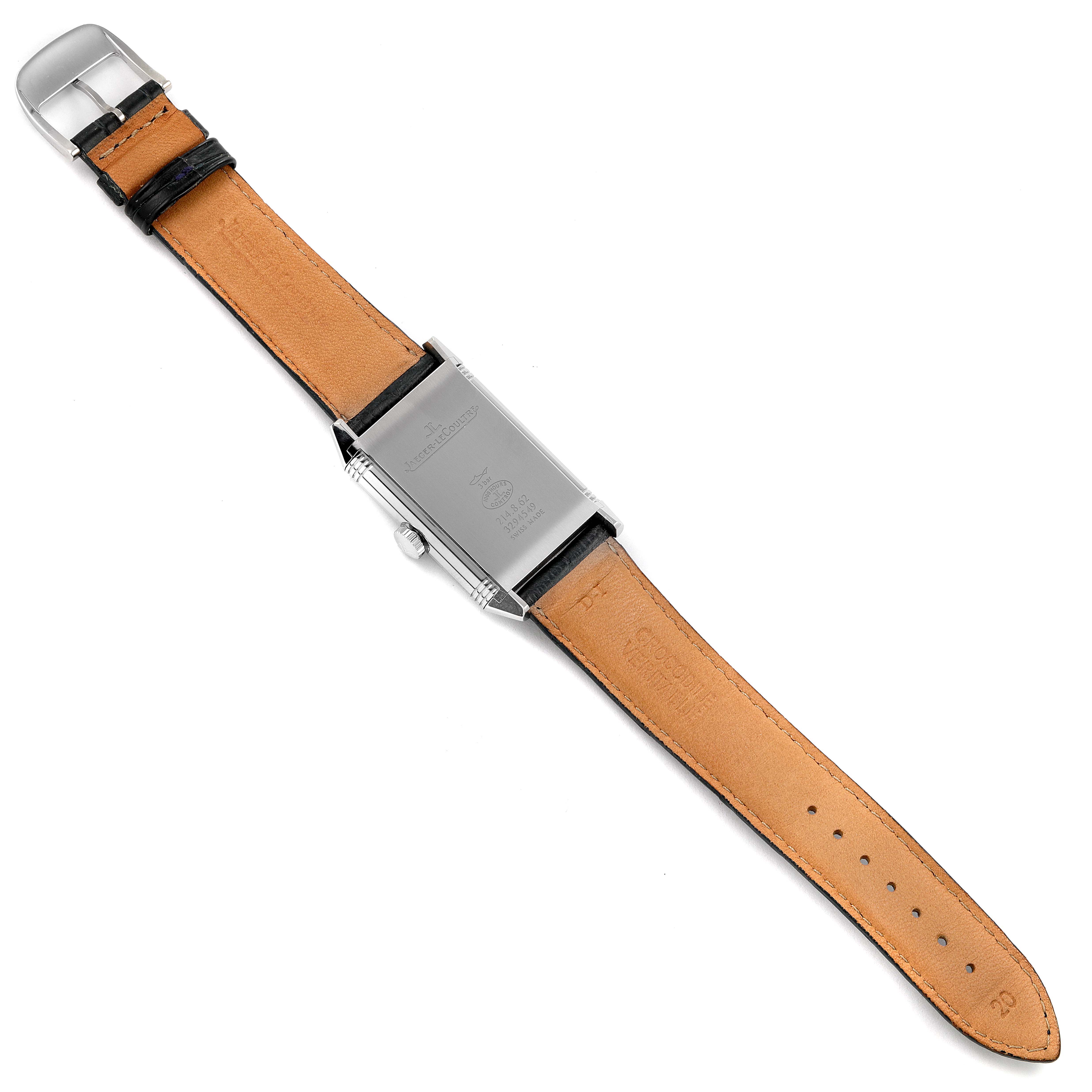The image shows the backcase and strap, laying flat, of a Jaeger-LeCoultre Reverso watch.