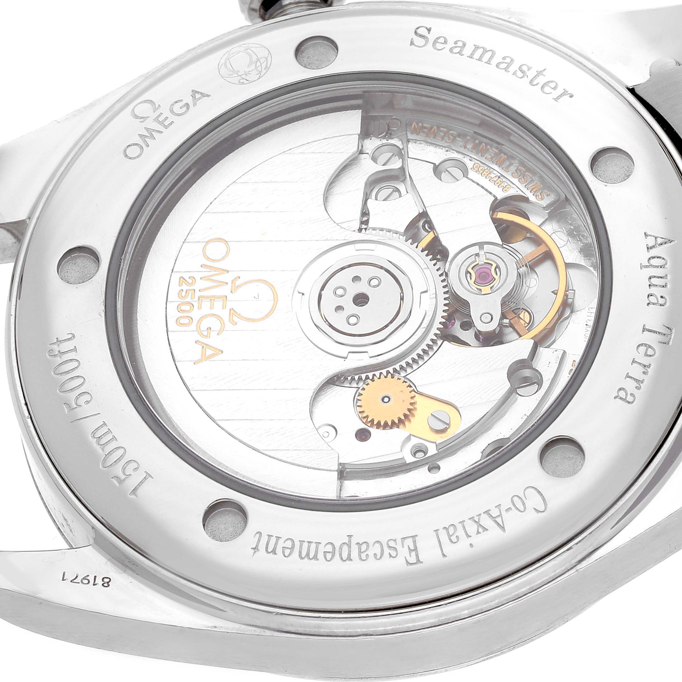 The image shows the back of the Omega Aqua Terra 2503.33.00 Men's Stainless Steel Silver Dial 2503.33.00 Men's Stainless Steel Silver Dial Seamaster watch, highlighting its Co-Axial escapement and inner mechanical movement.