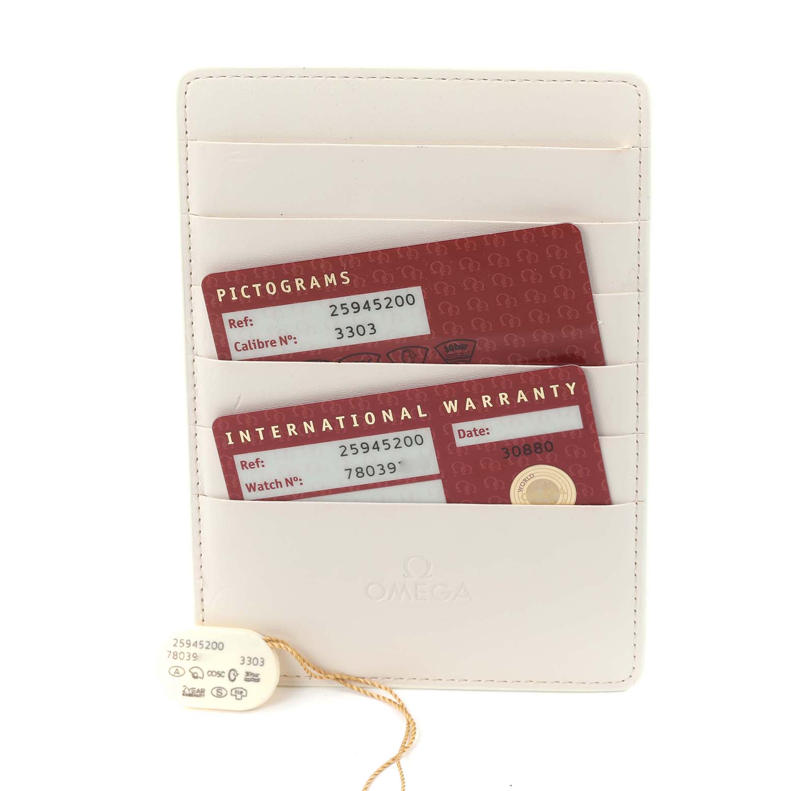 The image shows Omega Seamaster 2594.52.00 Men
s Stainless Steel Black Dial 2594.52.00 Men
s Stainless Steel Black Dial accessories, including warranty cards and a tag, viewed from above.