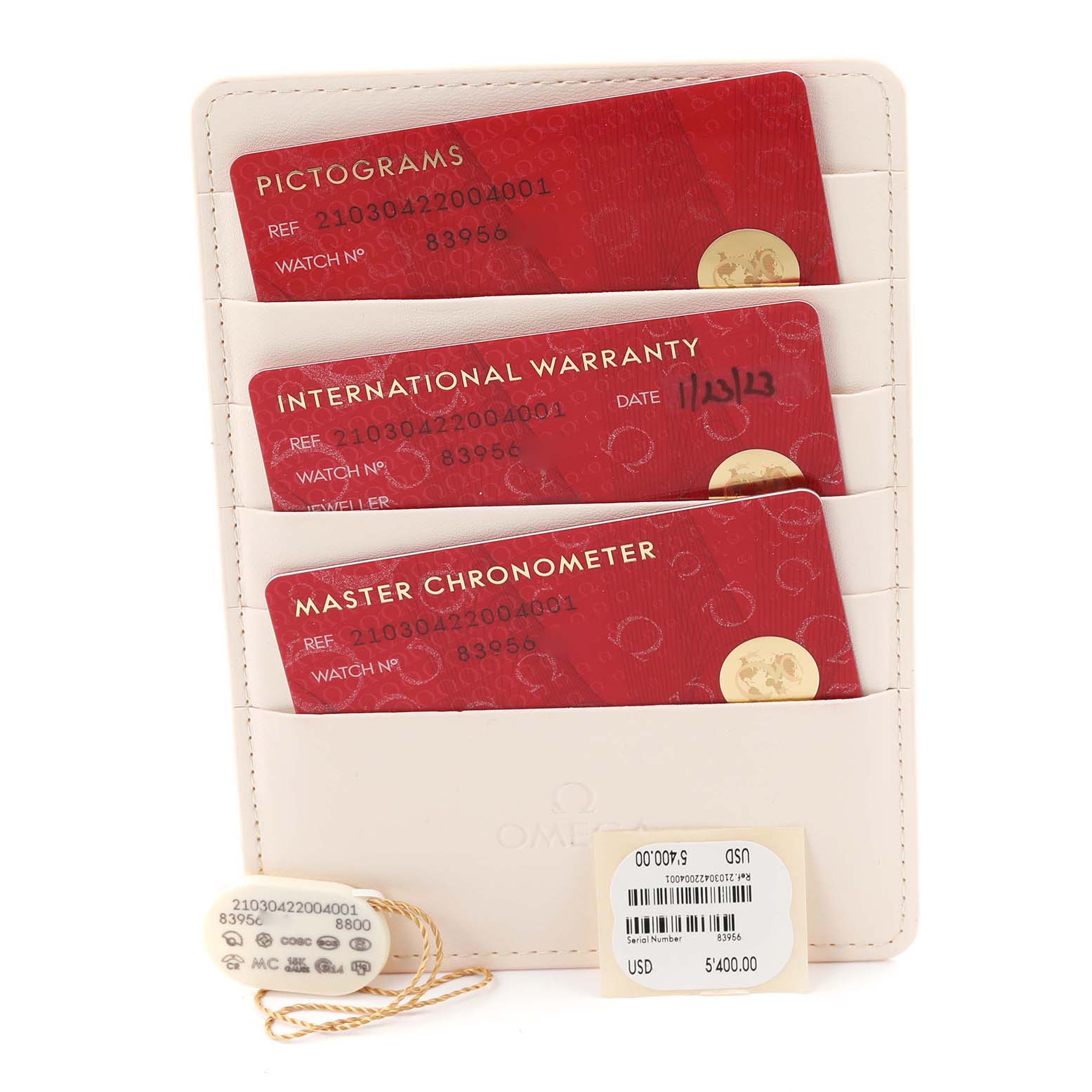 The image shows the warranty cards and tag for an Omega Seamaster 210.30.42.20.04.001 Men
s Stainless Steel White Dial 210.30.42.20.04.001 Men
s Stainless Steel White Dial model.