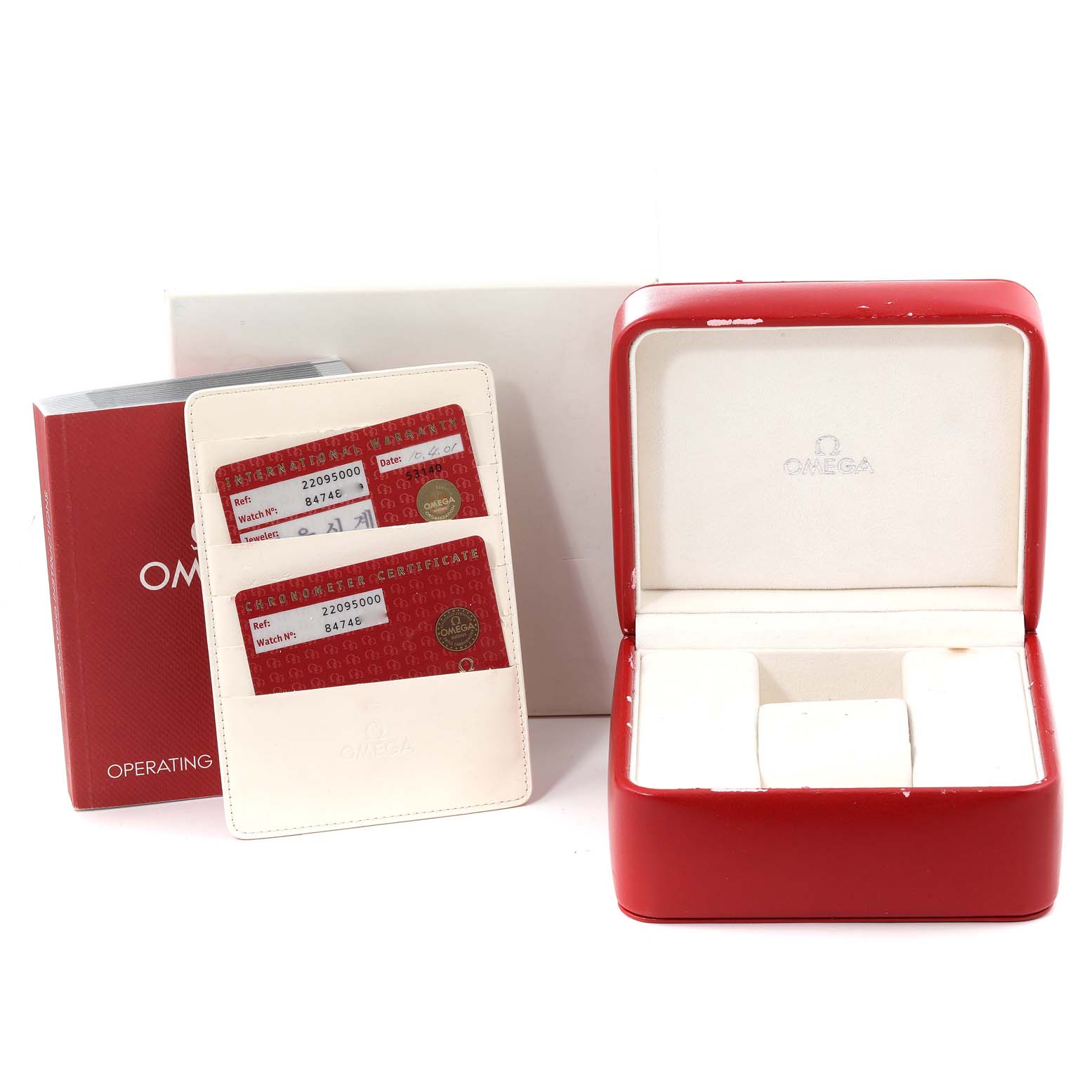 The image shows the packaging, operating instructions, and ownership documents for an Omega Planet Ocean 2209.50.00 Men
s Stainless Steel Black Dial 2209.50.00 Men
s Stainless Steel Black Dial watch.