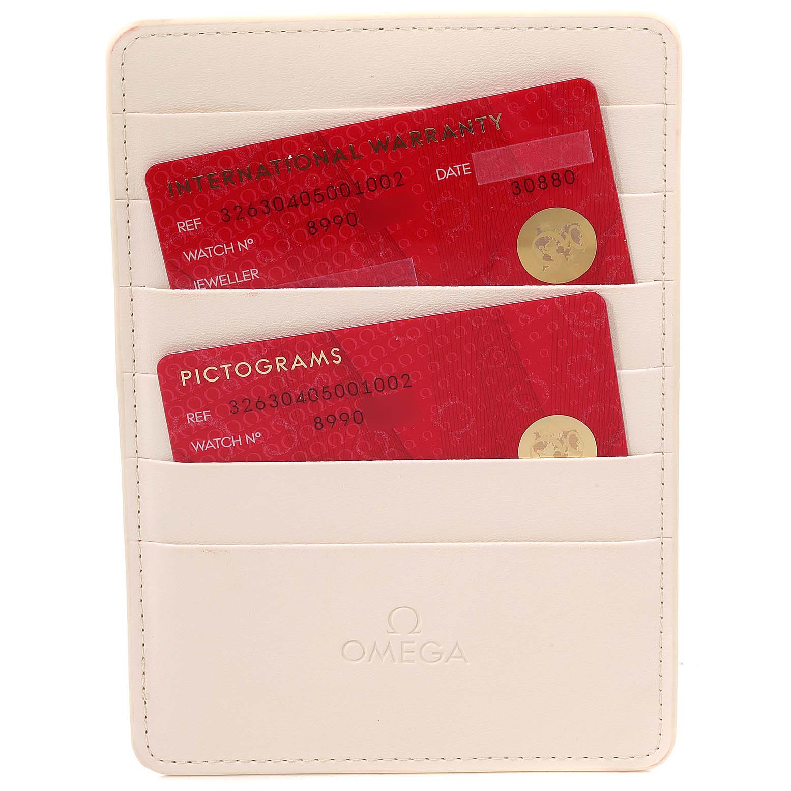 The image shows warranty and pictogram cards for an Omega Speedmaster 326.30.40.50.01.002 Men's Stainless Steel Black Dial 326.30.40.50.01.002 Men's Stainless Steel Black Dial watch, placed inside a cream-colored cardholder.