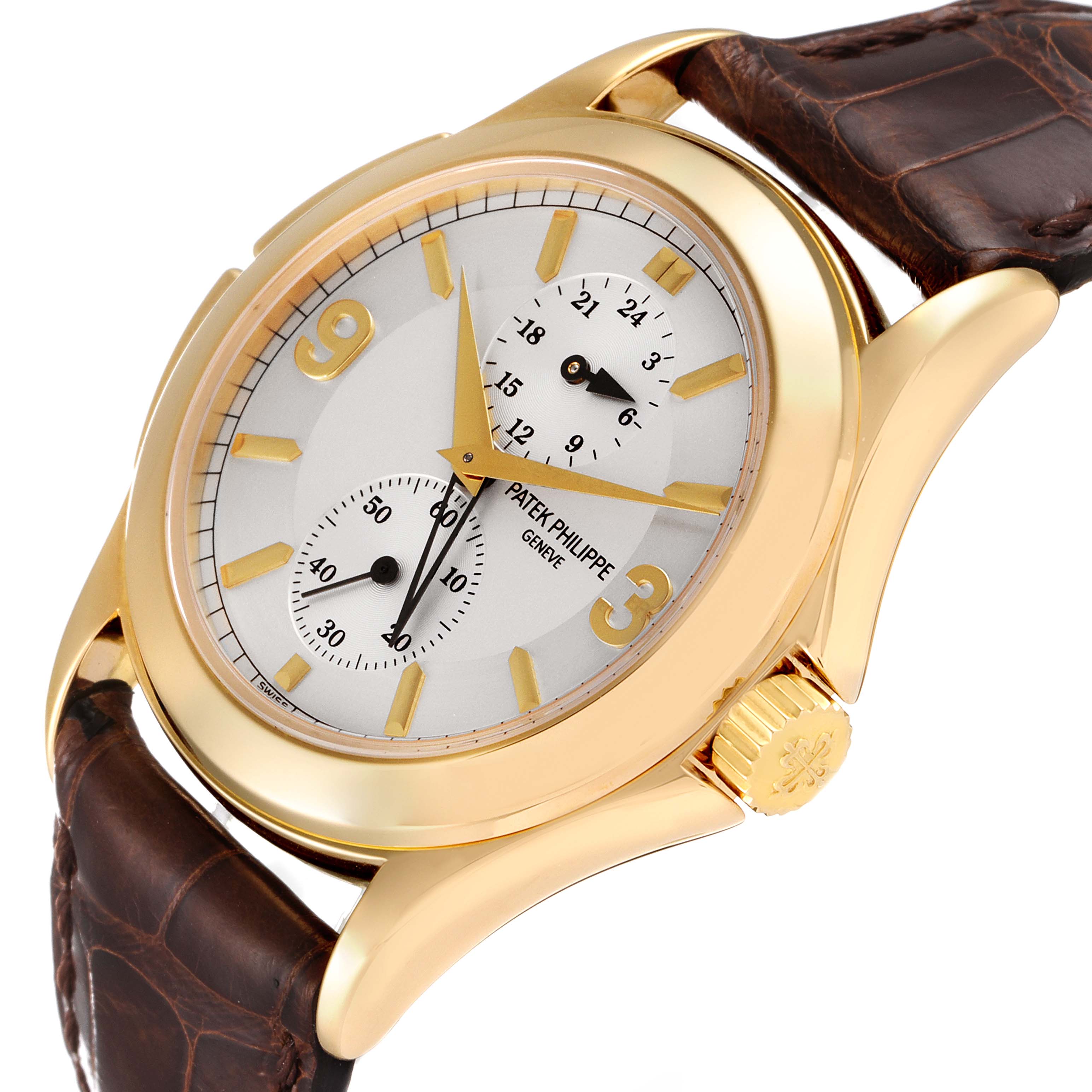 The Patek Philippe Calatrava 5134J Men's Yellow Gold White Dial 5134J Men's Yellow Gold White Dial watch is shown at a slightly tilted angle, highlighting its gold case, dial, and brown leather strap.