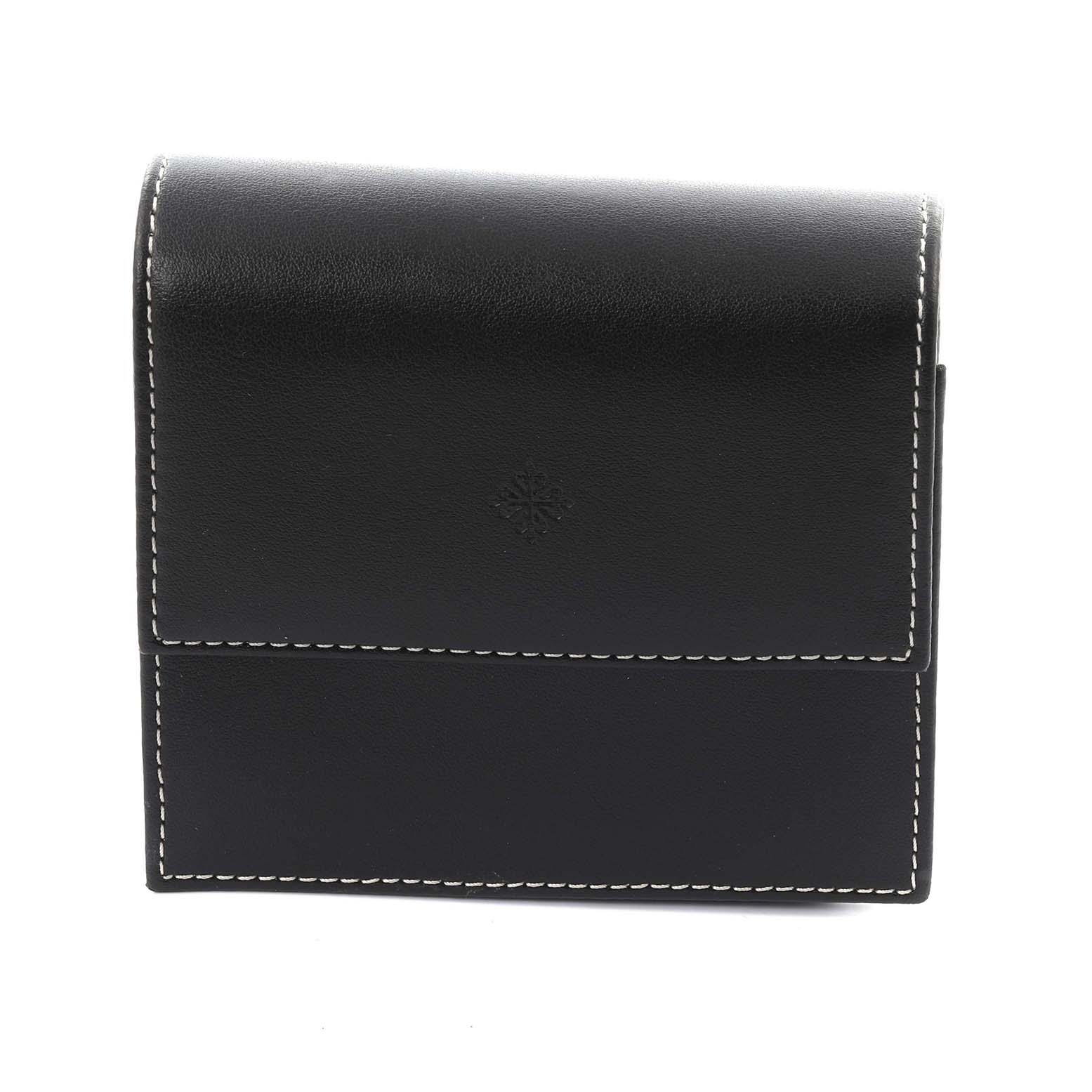 This image shows a black leather case, likely for the Patek Philippe Gondolo 4825 Women's Yellow Gold White Dial 4825 Women's Yellow Gold White Dial watch, with white stitching and an embossed logo.