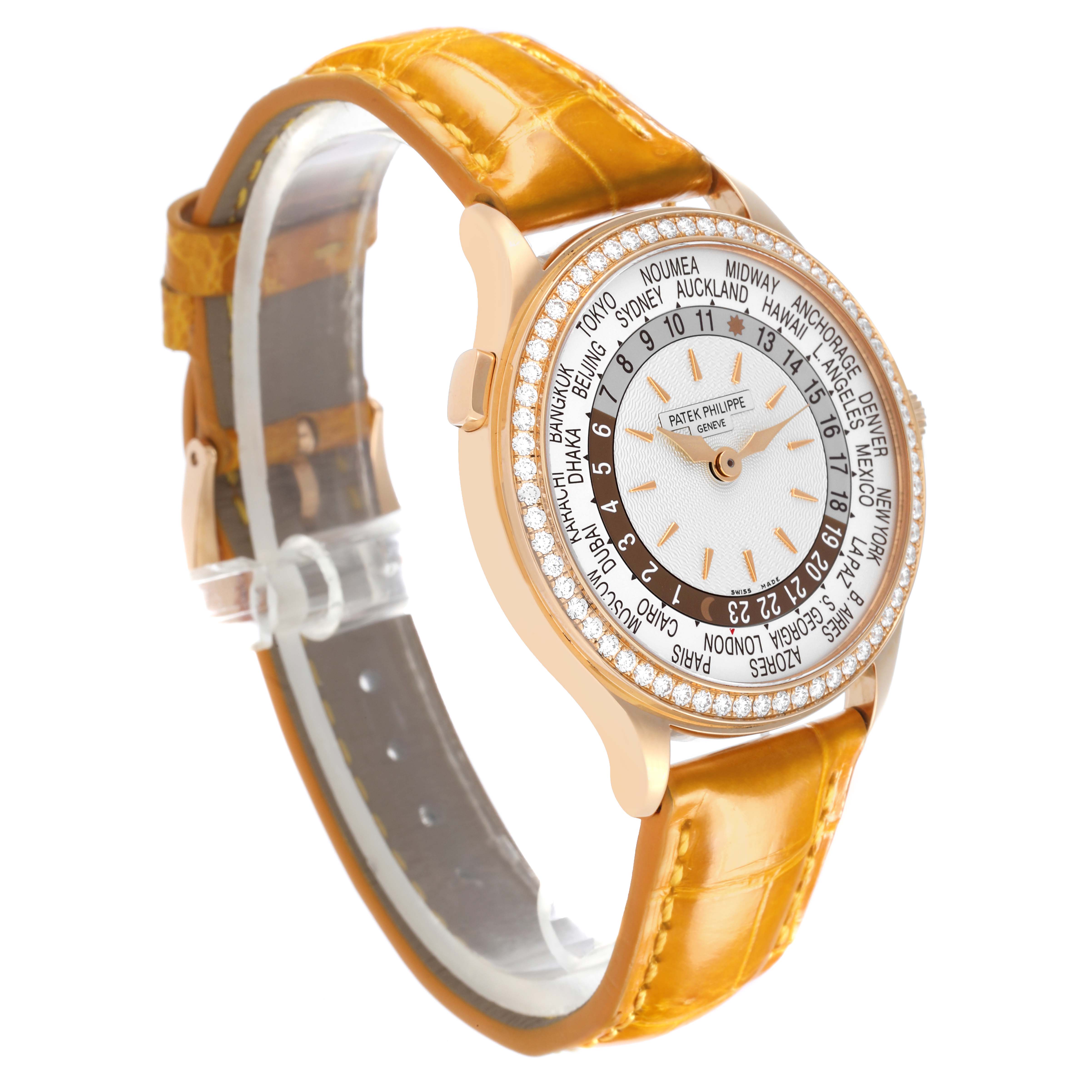 The Patek Philippe Complications 7130R-013 Men's Rose Gold Silver Dial 7130R-013 Men's Rose Gold Silver Dial watch is shown at a side angle, displaying its face, bezel, and leather strap.