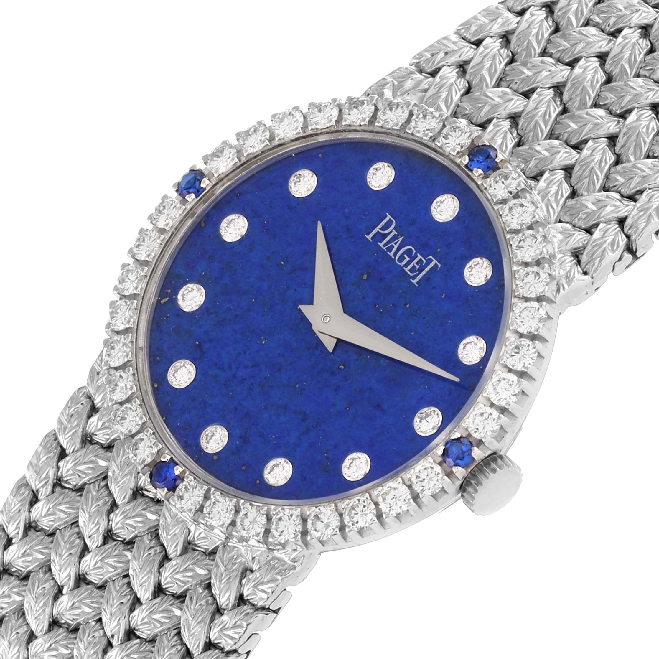 The Piaget 9706D2 Women's White Gold Blue Dial 9706D2 Women's White Gold Blue Dial Tradition 9706D2 watch is shown from a top angle, featuring its blue diamond dial and textured bracelet.