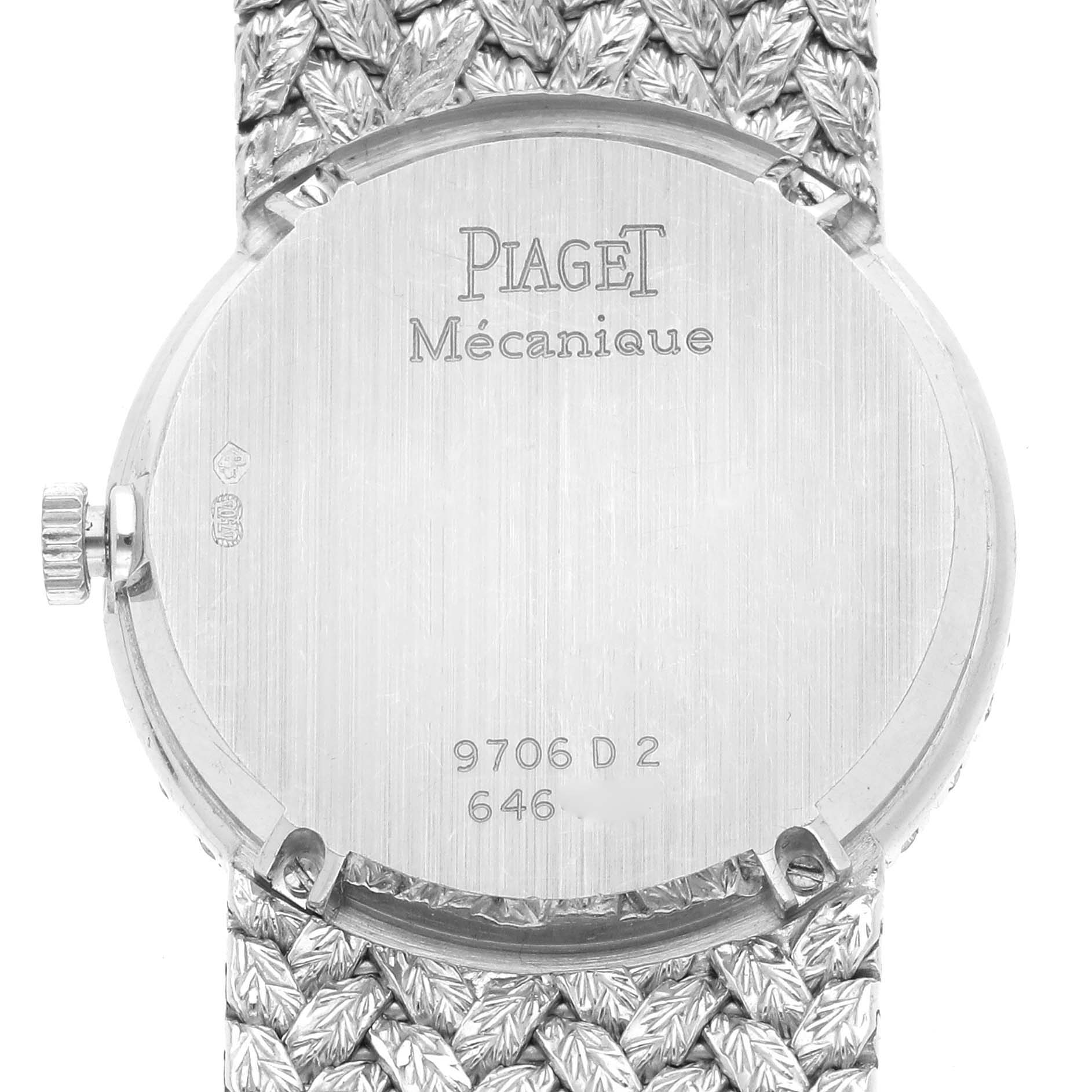 The image shows the back of a Piaget 9706D2 Women's White Gold Blue Dial 9706D2 Women's White Gold Blue Dial Tradition White Gold Diamond Dial Vintage Ladies Watch 9706D2, including the watch case and bracelet.