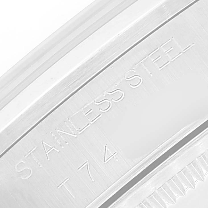 This image shows the engraving on the stainless steel case back of a Rolex Air-King 14000 Men's Stainless Steel Silver Dial 14000 Men's Stainless Steel Silver Dial watch.
