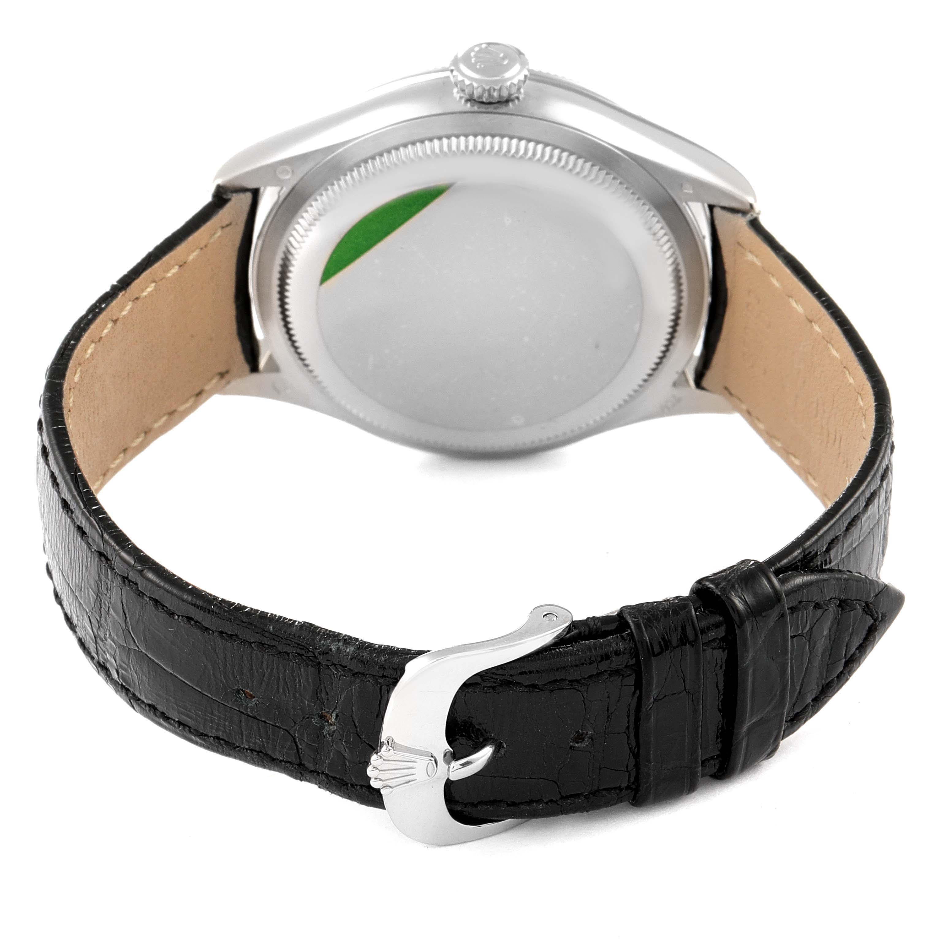 The image shows the back view of a Rolex Cellini 50609RBR Men's White Gold Black Dial 50609RBR Men's White Gold Black Dial watch, highlighting the case back, black leather strap, and buckle.