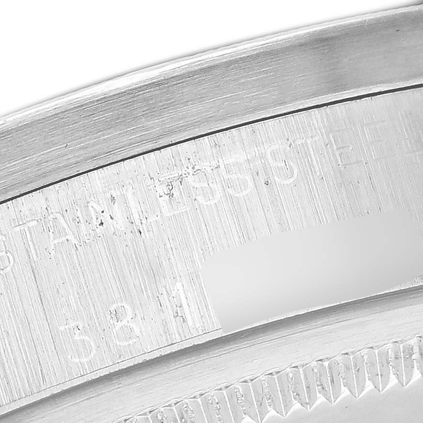 Close-up of the engraved edge and inner markings on a Rolex Date 1501 Men's Stainless Steel Silver Dial 1501 Men's Stainless Steel Silver Dial model watch.