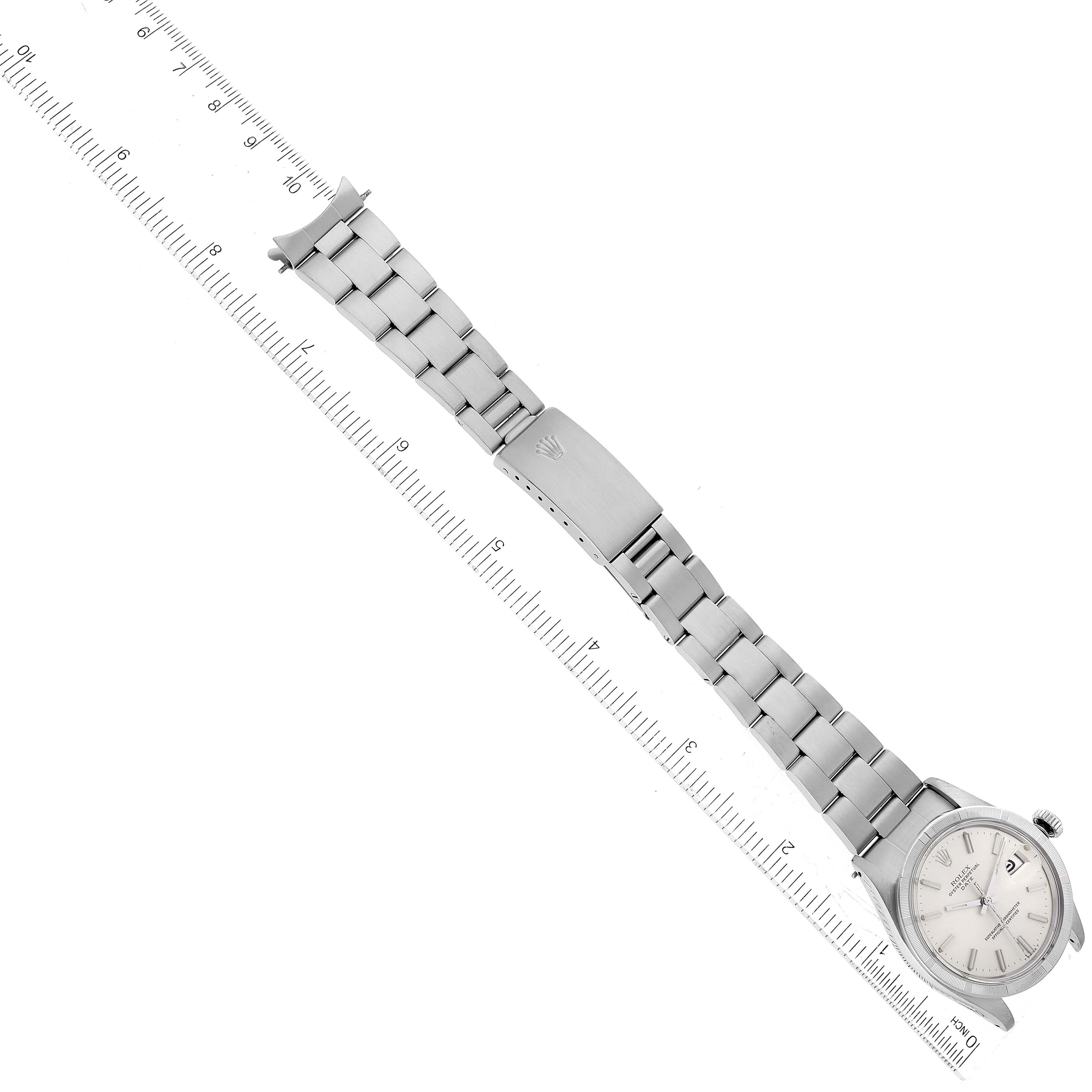 The image shows a full top-down view of a Rolex Date 1501 Men's Stainless Steel Silver Dial 1501 Men's Stainless Steel Silver Dial model watch, including the face, bracelet, and clasp.