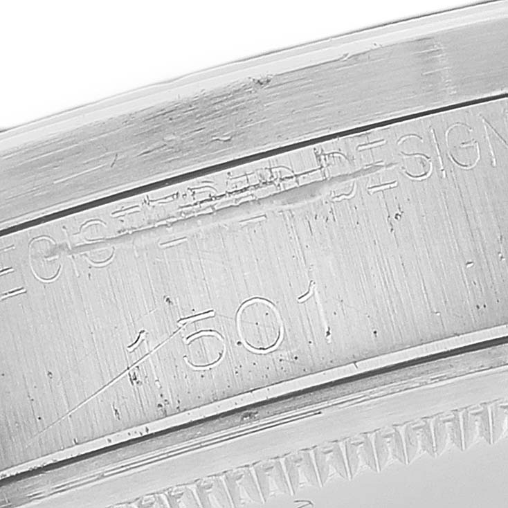 This is a close-up image of the inner case back and serial number of a Rolex Date 1501 Men's Stainless Steel Grey Dial 1501 Men's Stainless Steel Grey Dial model.