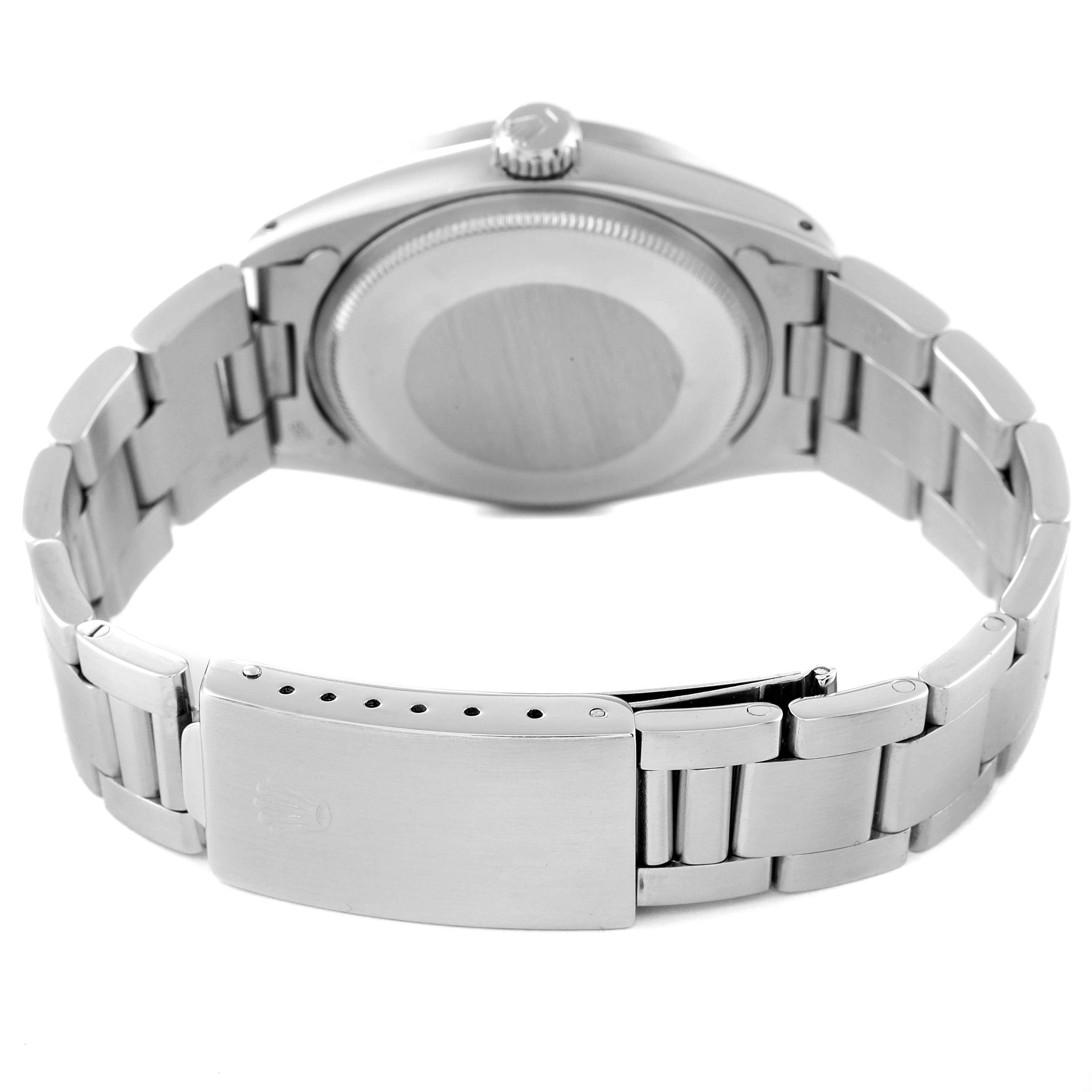 This image shows the back case and bracelet clasp of a Rolex Date 1501 Men's Stainless Steel Grey Dial 1501 Men's Stainless Steel Grey Dial model watch.