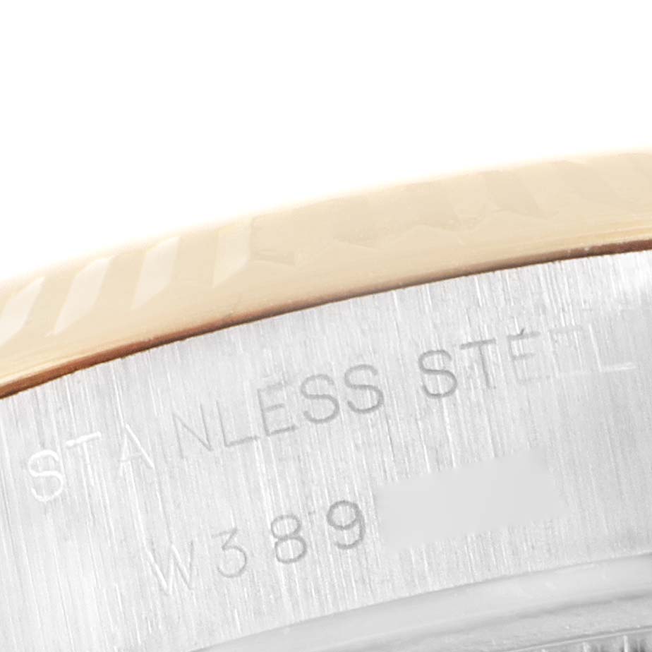 This image shows a close-up of the stainless steel caseback edge with part of the serial number of a Rolex Datejust 69173 Women's Steel and Gold (two tone) Champagne Dial 69173 Women's Steel and Gold (two tone) Champagne Dial watch.