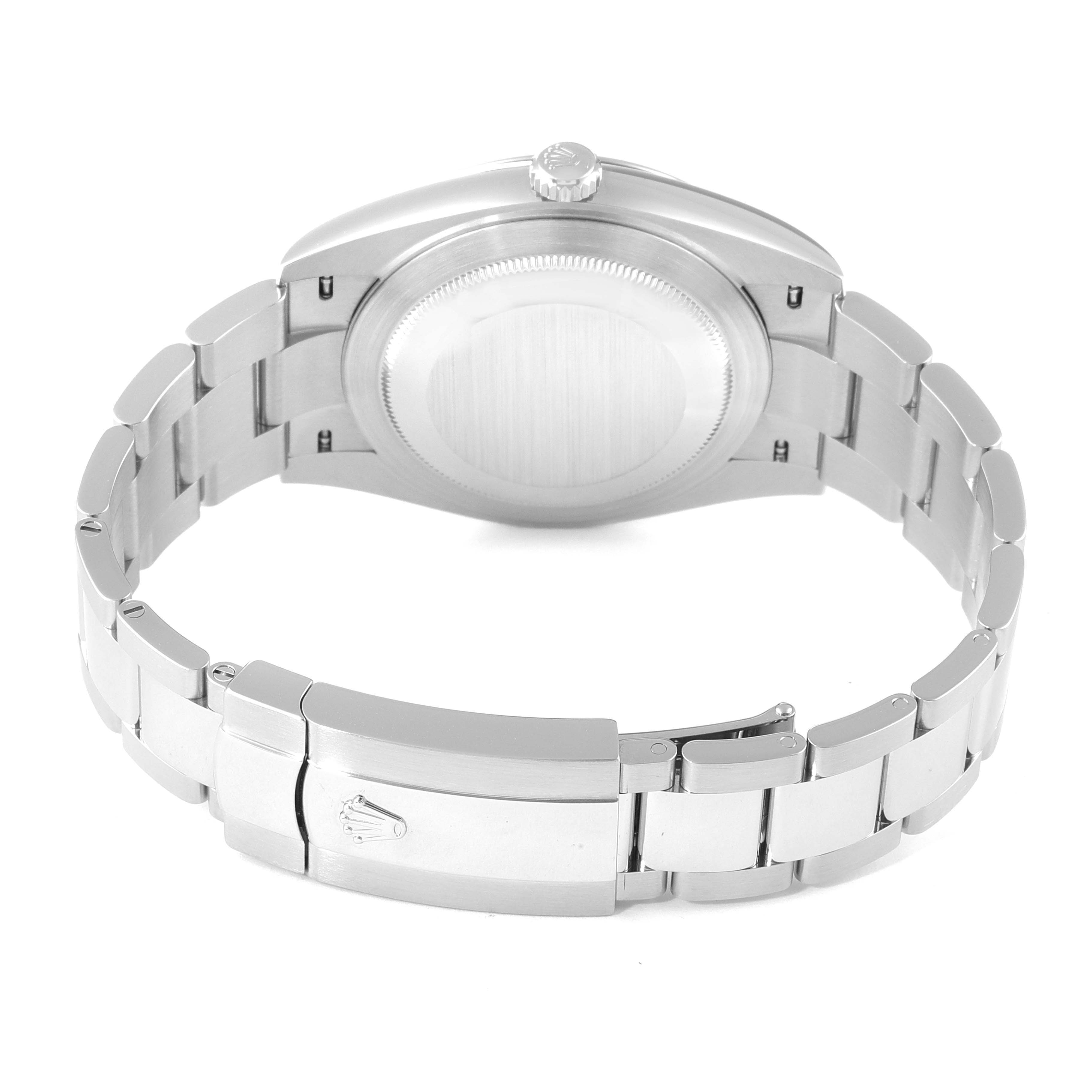 The image shows the back view of a Rolex Datejust 41 126300 Men
s Stainless Steel Blue Dial 126300 Men
s Stainless Steel Blue Dial watch, including the case back, crown, and clasp.