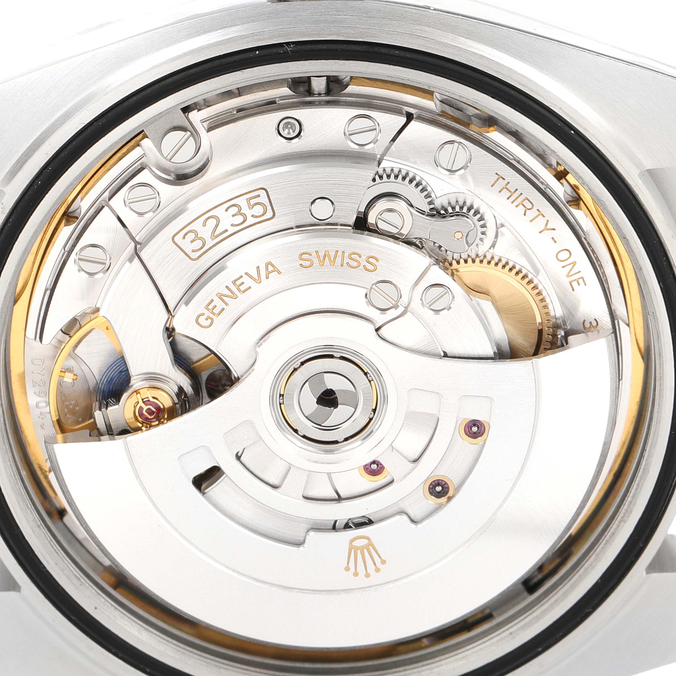 This image shows the automatic movement mechanism of a Rolex Datejust 41 126300 Men
s Stainless Steel Blue Dial 126300 Men
s Stainless Steel Blue Dial watch from a close-up, rear angle.