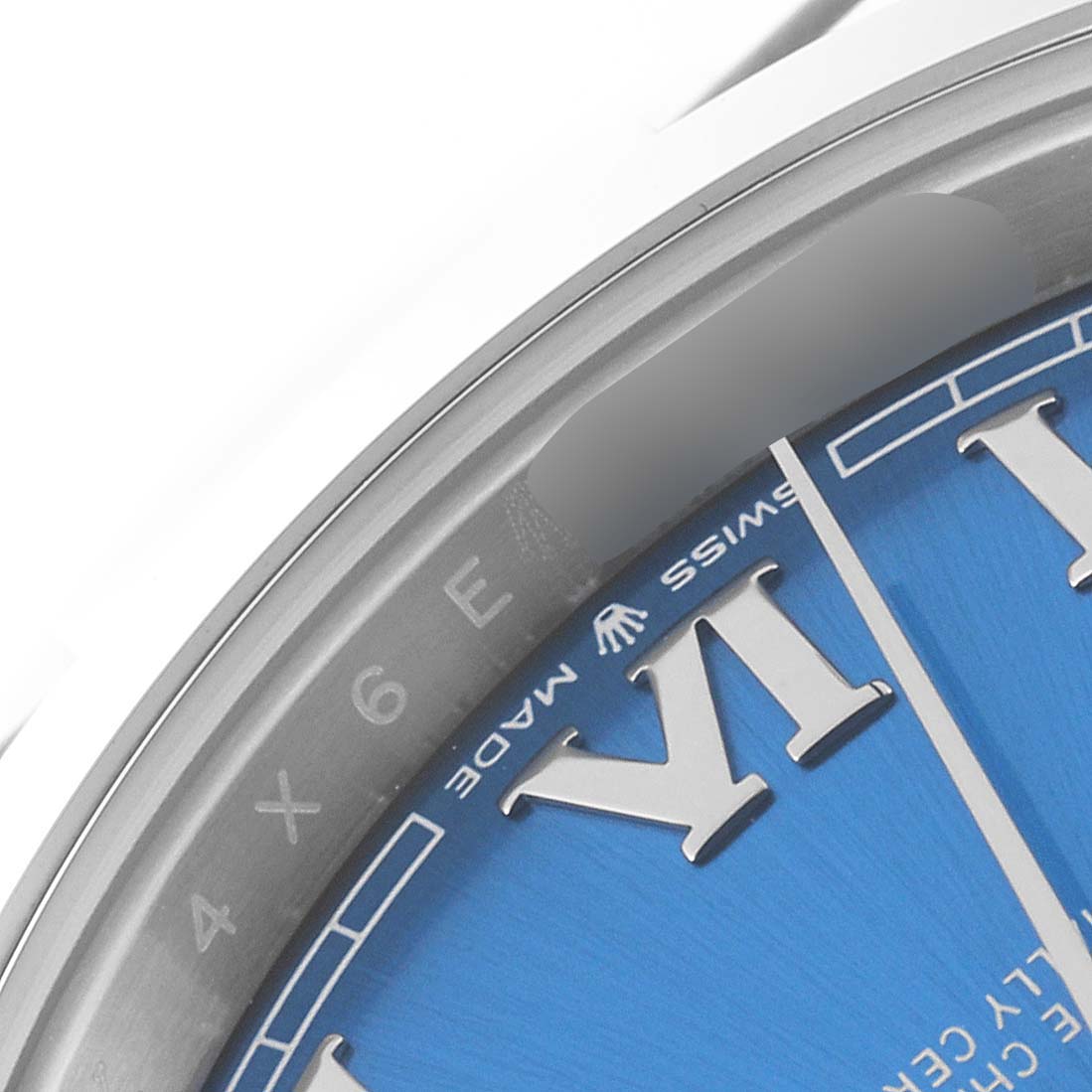 The image shows a close-up of the dial, bezel, and part of the chapter ring of the Rolex Datejust 41 126300 Men
s Stainless Steel Blue Dial 126300 Men
s Stainless Steel Blue Dial watch.