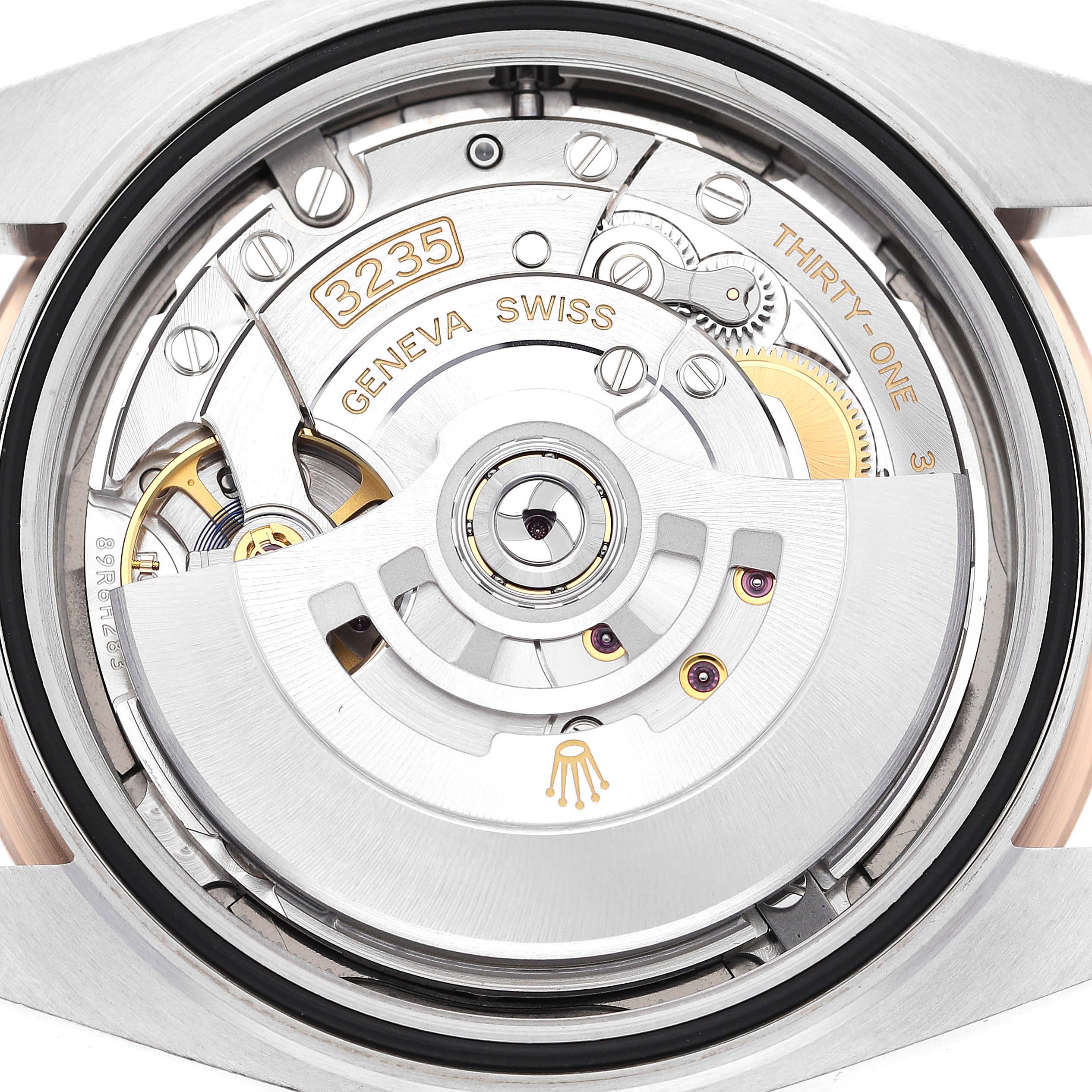 This image shows the back view of the Rolex Datejust 41 126331 Men's Steel and Gold (two tone) Grey Dial 126331 Men's Steel and Gold (two tone) Grey Dial, revealing its intricate movement and internal mechanics.