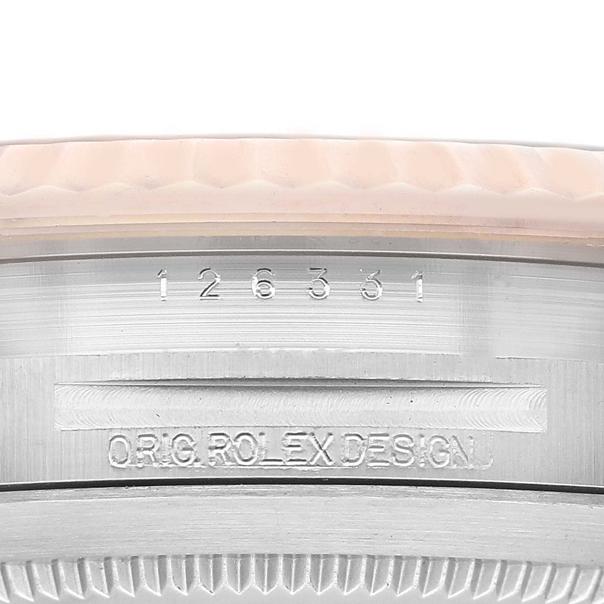 The image shows a close-up of the serial number and engraving on the side of the Rolex Datejust 41 126331 Men's Steel and Gold (two tone) Grey Dial 126331 Men's Steel and Gold (two tone) Grey Dial watch.