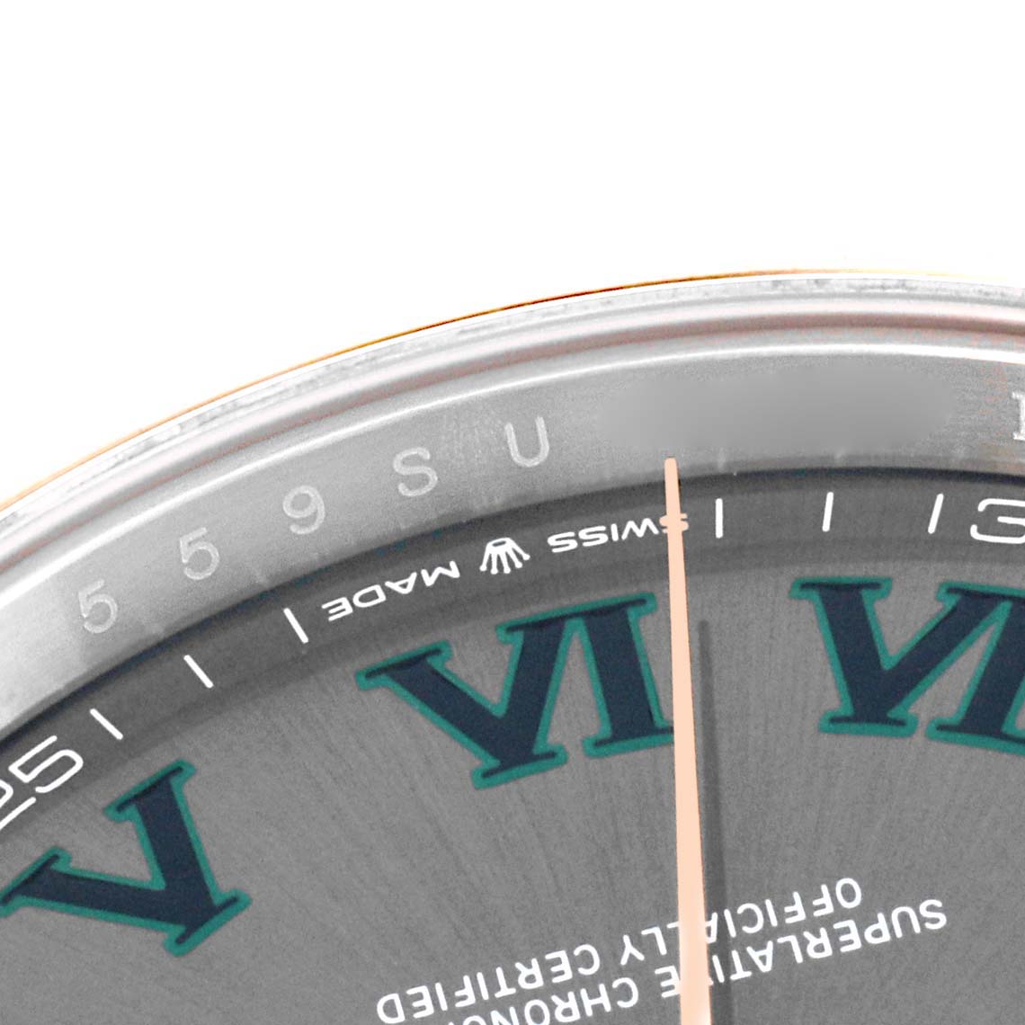 This close-up image of a Rolex Datejust 41 126331 Men's Steel and Gold (two tone) Grey Dial 126331 Men's Steel and Gold (two tone) Grey Dial watch shows part of the dial, including Roman numerals, the "SWISS MADE" text, and the second hand.