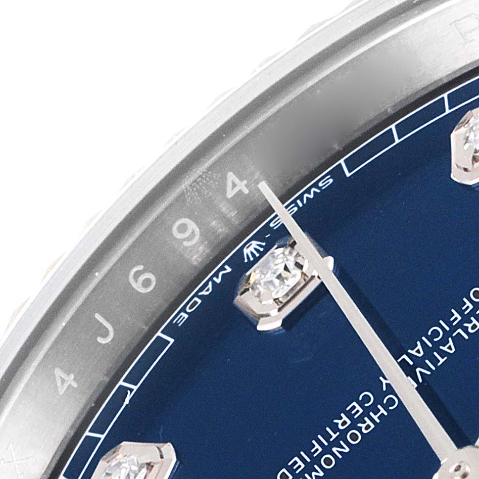 This close-up of the Rolex Datejust 41 126334 Men's Stainless Steel Blue Dial 126334 Men's Stainless Steel Blue Dial model shows parts of the dial, markers, and a portion of the bezel.