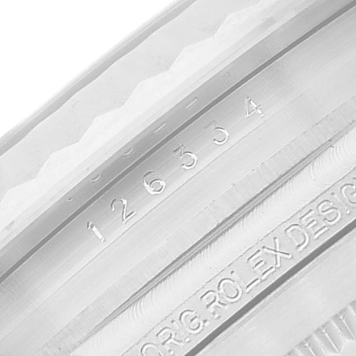 This close-up image shows the serial number engraving on the inner bezel of a Rolex Datejust 41 126334 Men's Stainless Steel Blue Dial 126334 Men's Stainless Steel Blue Dial watch.