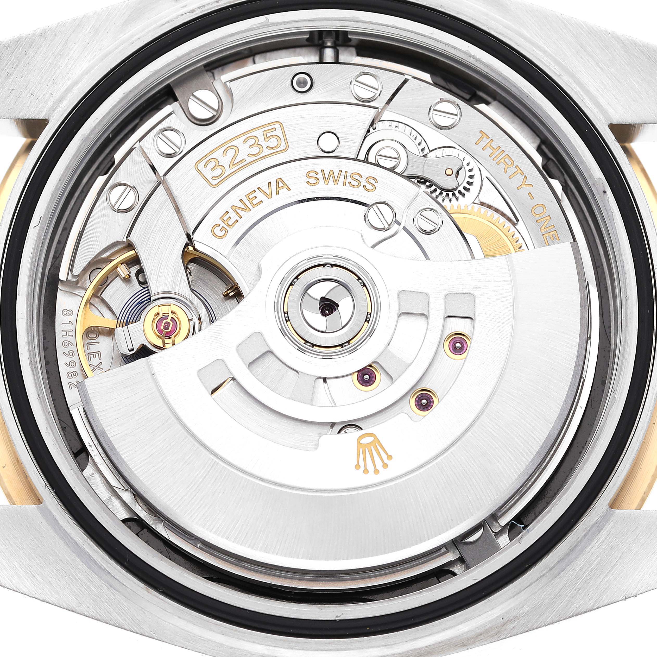 This image shows the movement and inner mechanisms of the Rolex Datejust 41 126333 Men's Steel and Gold (two tone) Black Dial 126333 Men's Steel and Gold (two tone) Black Dial model.