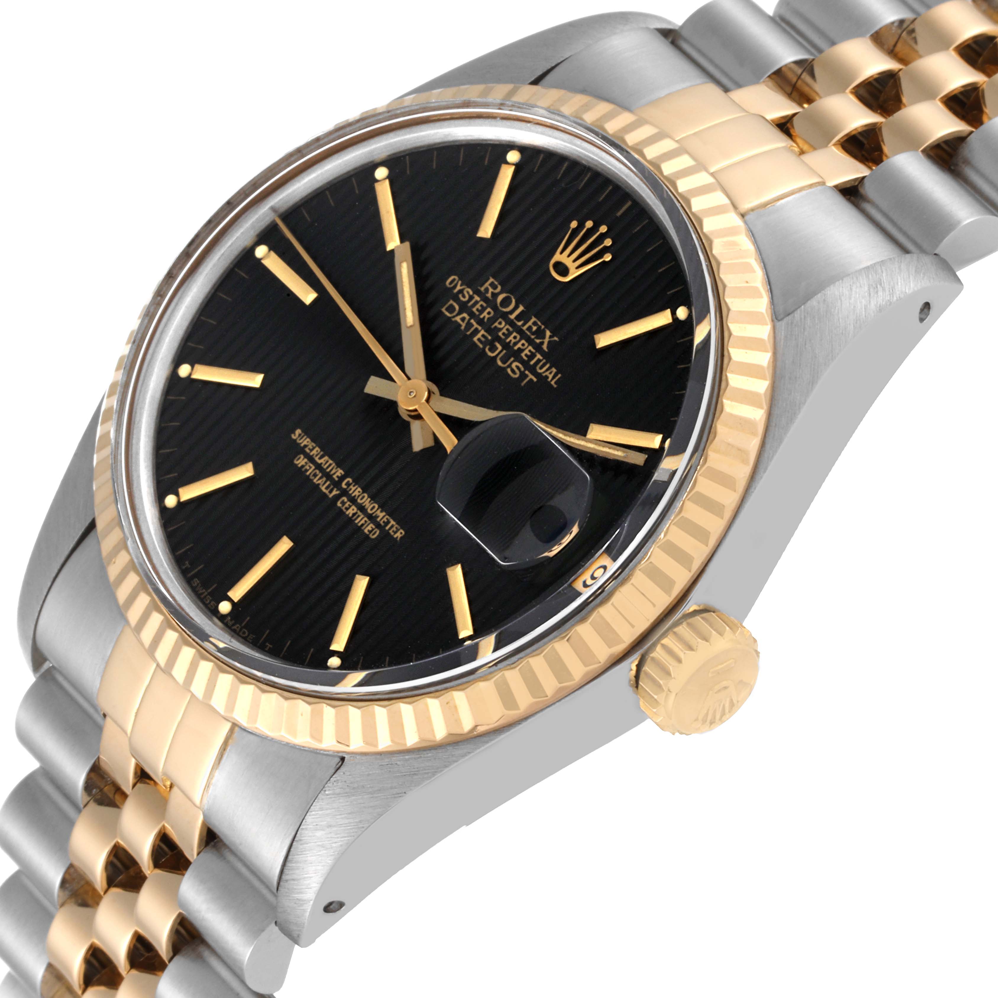 This image shows a close-up angled view of the Rolex Vintage Collection 16013 Men's Steel and Gold (two tone) Black Dial 16013 Men's Steel and Gold (two tone) Black Dial model's black dial, date magnifier, and two-tone bracelet.