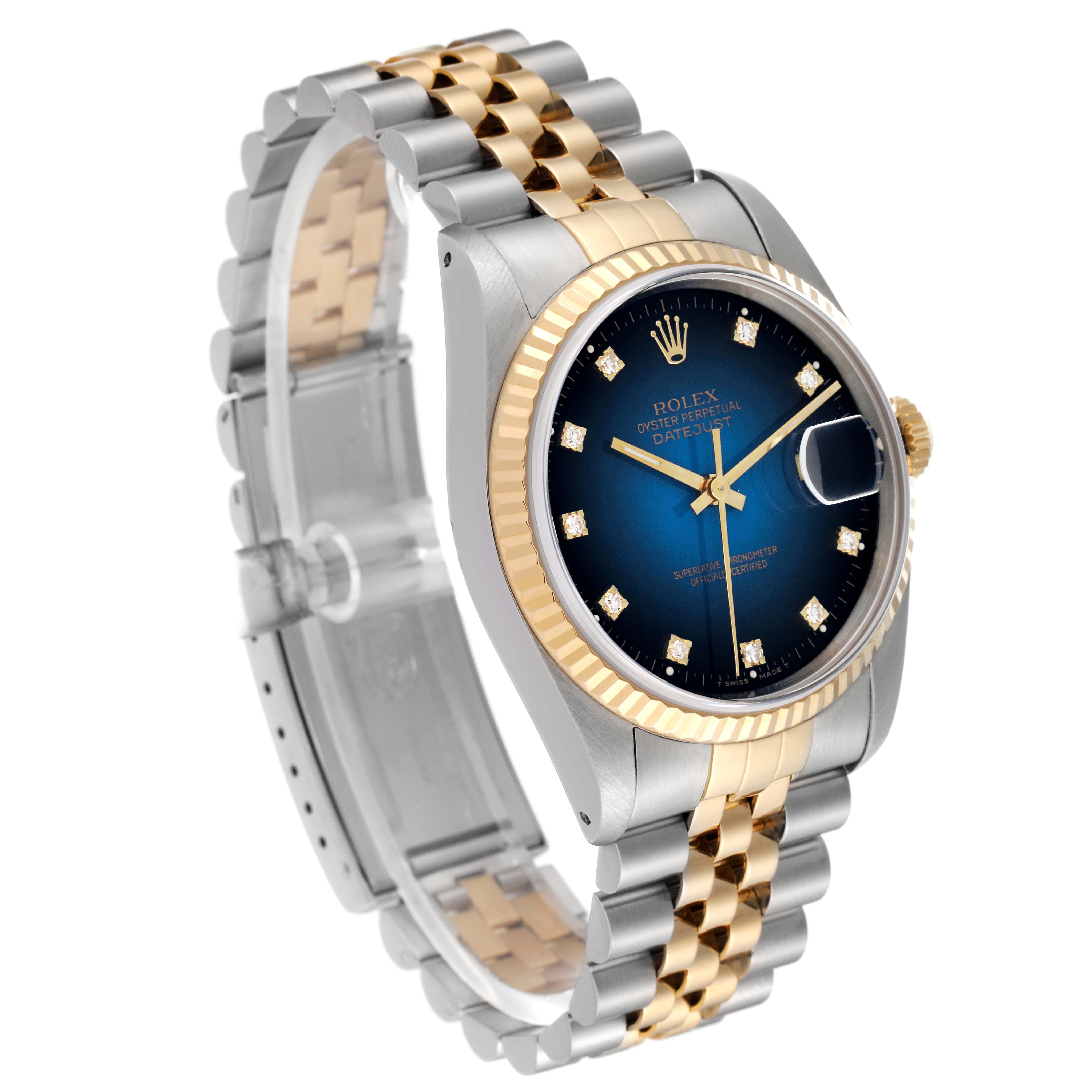 This image shows a Rolex Datejust 16233G Men's Steel and Gold (two tone) Blue Dial 16233G Men's Steel and Gold (two tone) Blue Dial watch from a front angle, highlighting its blue dial, diamond markers, and two-tone bracelet.