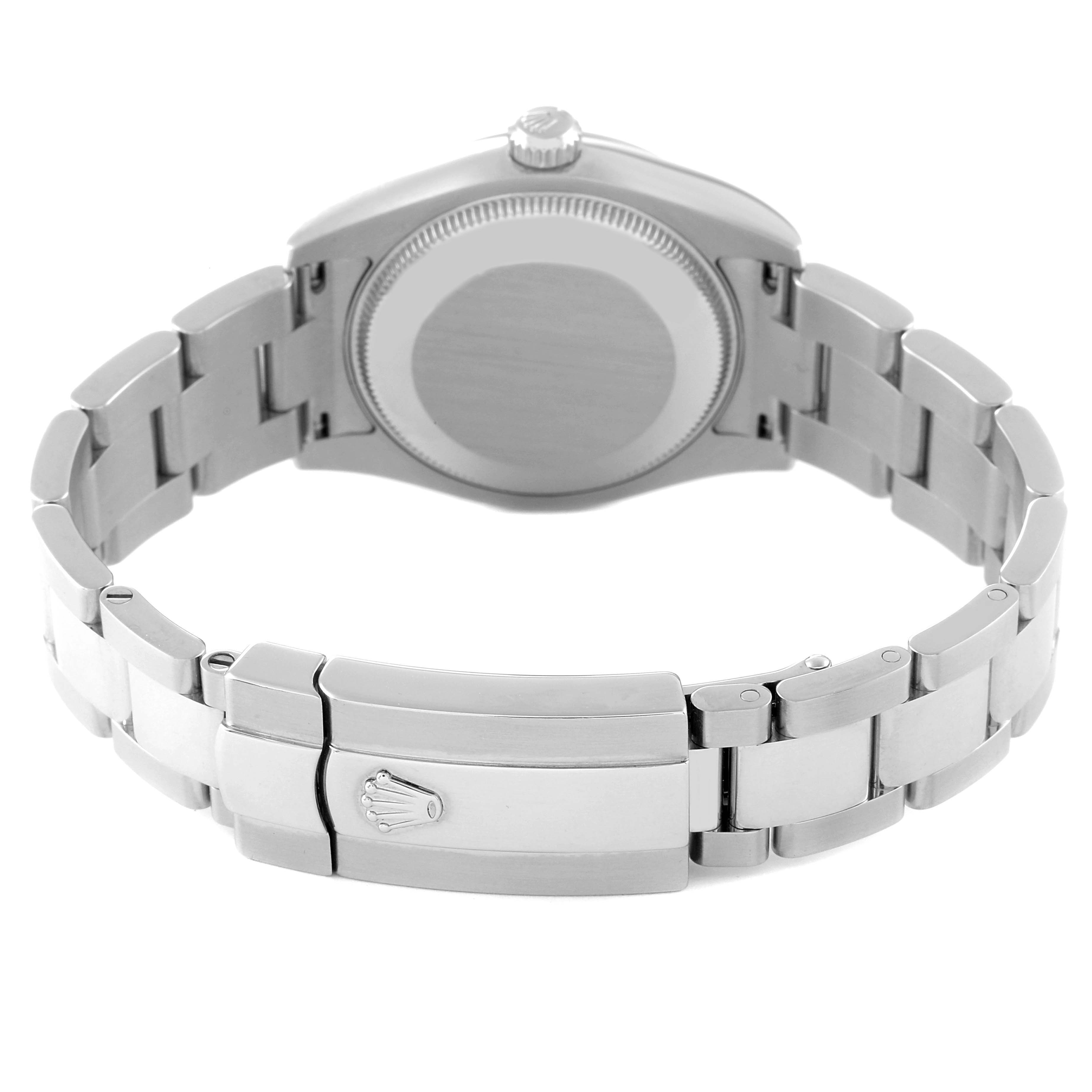 The image shows the back view, clasp, and bracelet of a Mid-Size Rolex watch.