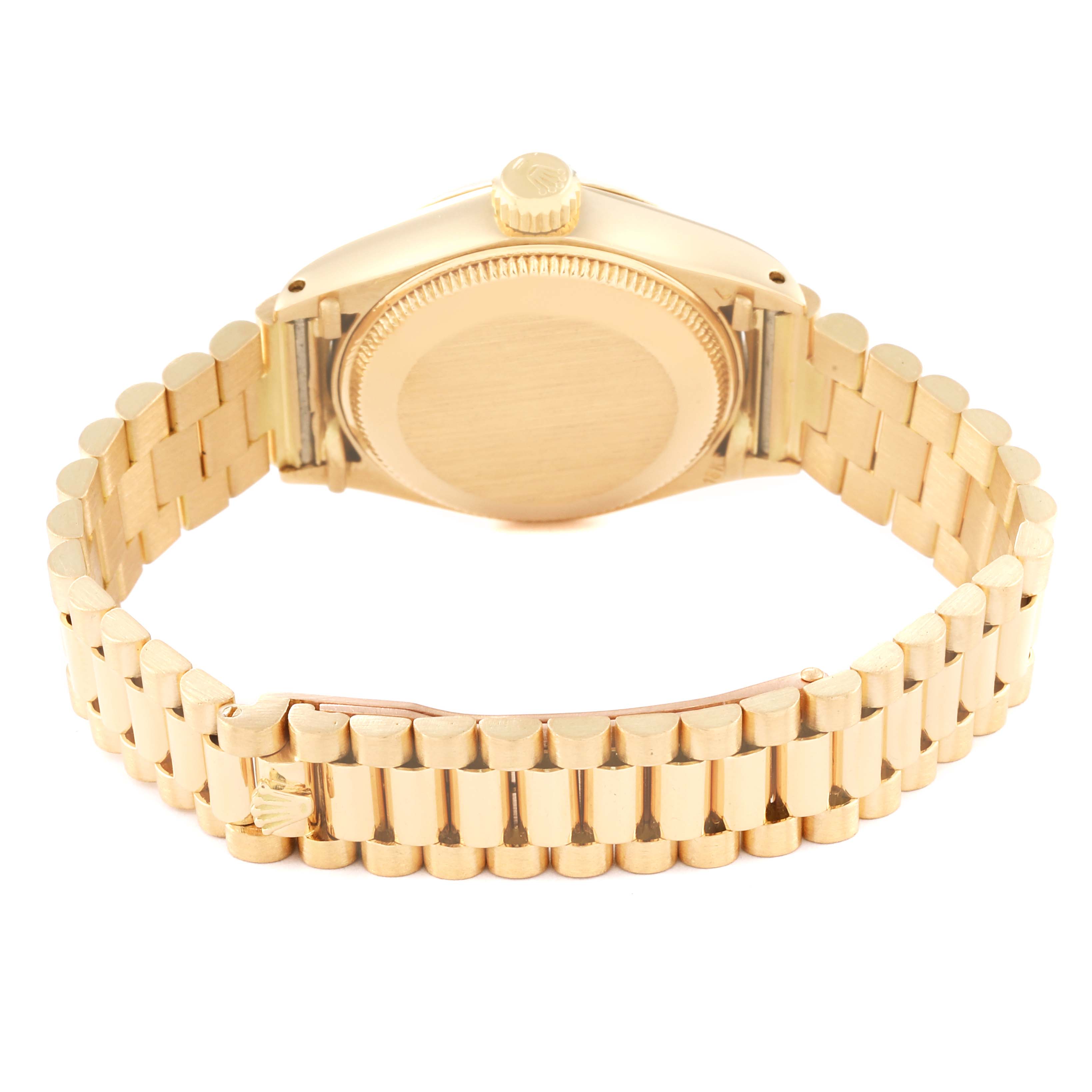This image shows the back case and bracelet clasp of a Rolex President 6917 Women's Yellow Gold Silver Dial 6917 Women's Yellow Gold Silver Dial model watch from a rear angle.
